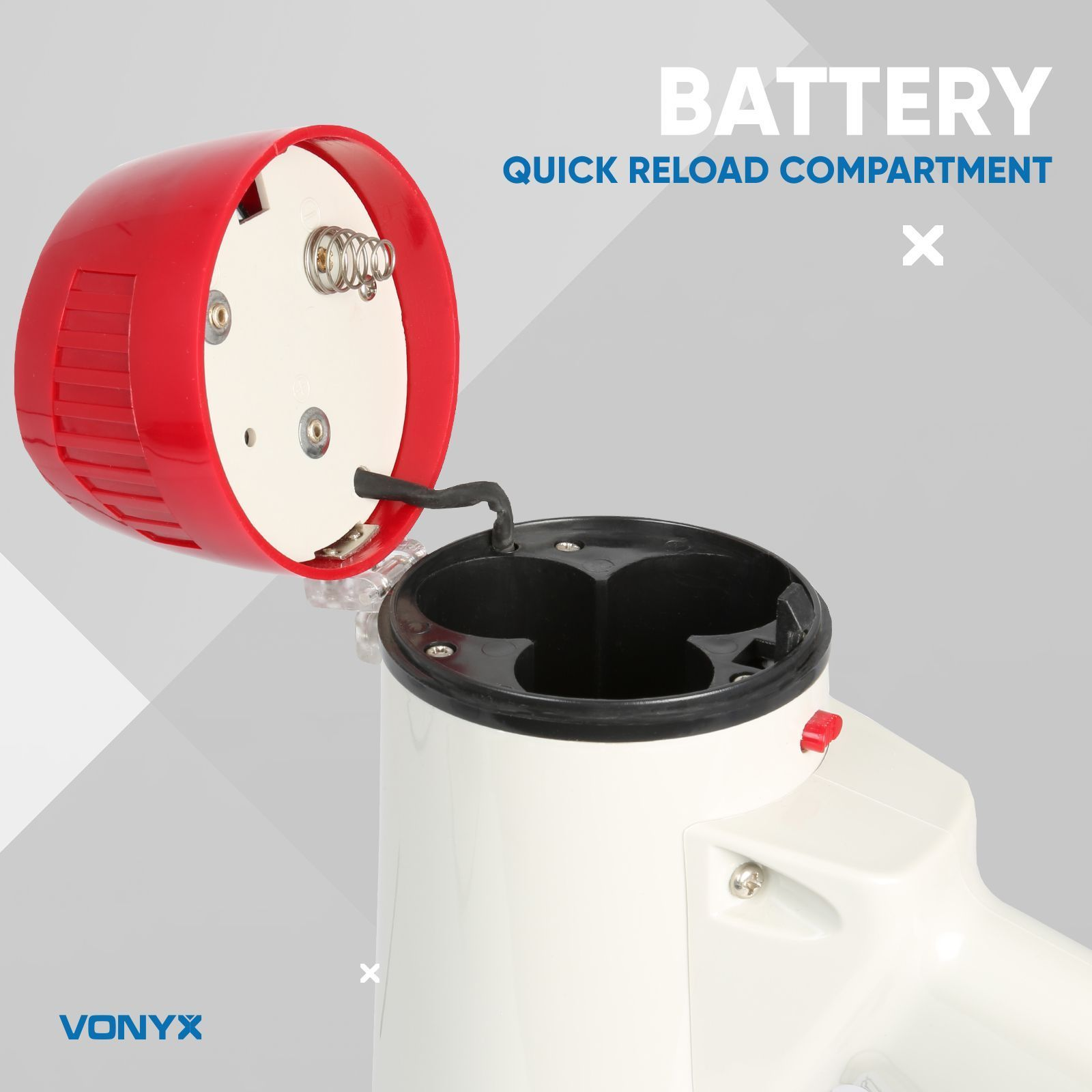 White device with a red top open. It is a battery compartment.