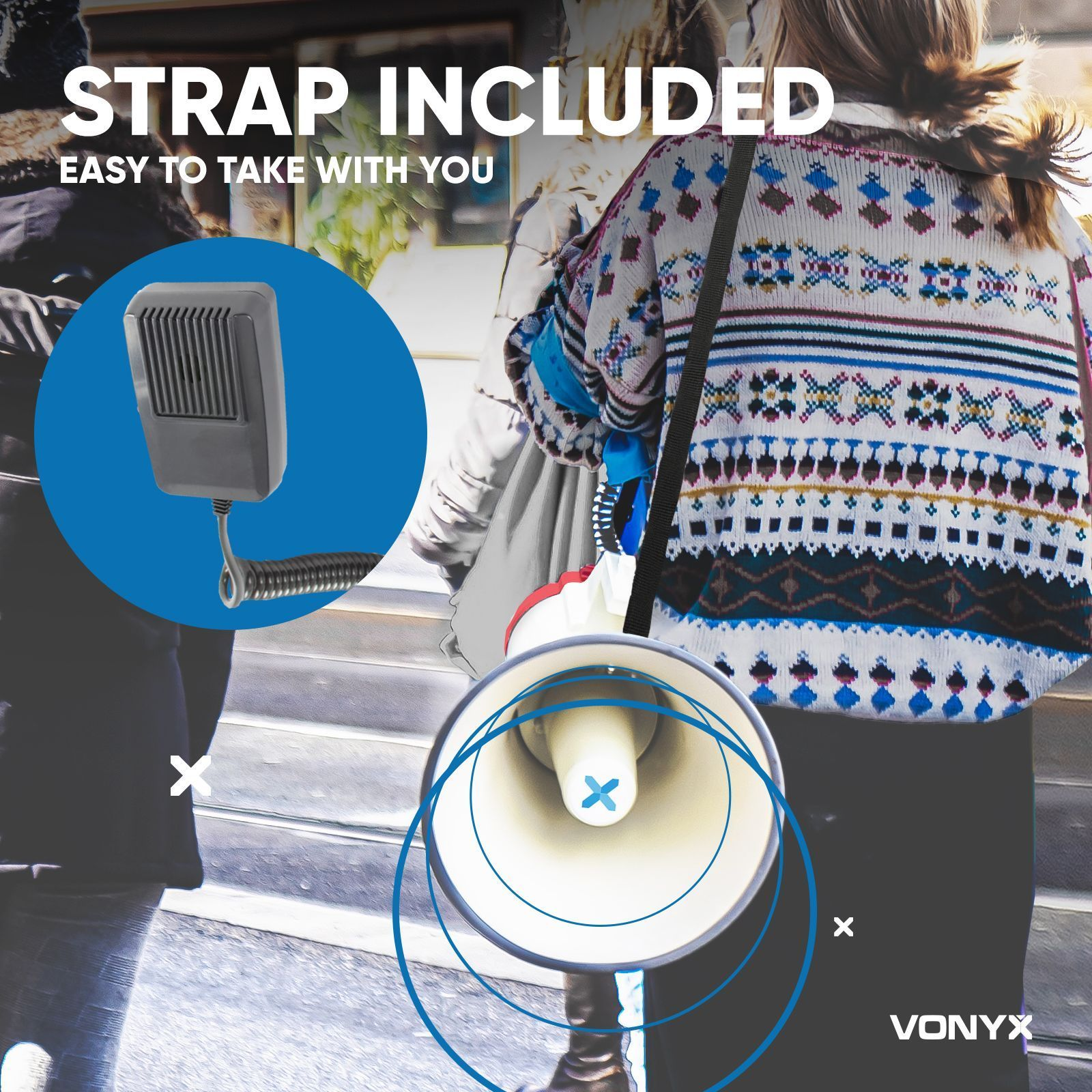 Person holding a megaphone.Text: Strap included, easy to take with you. A microphone is attached.