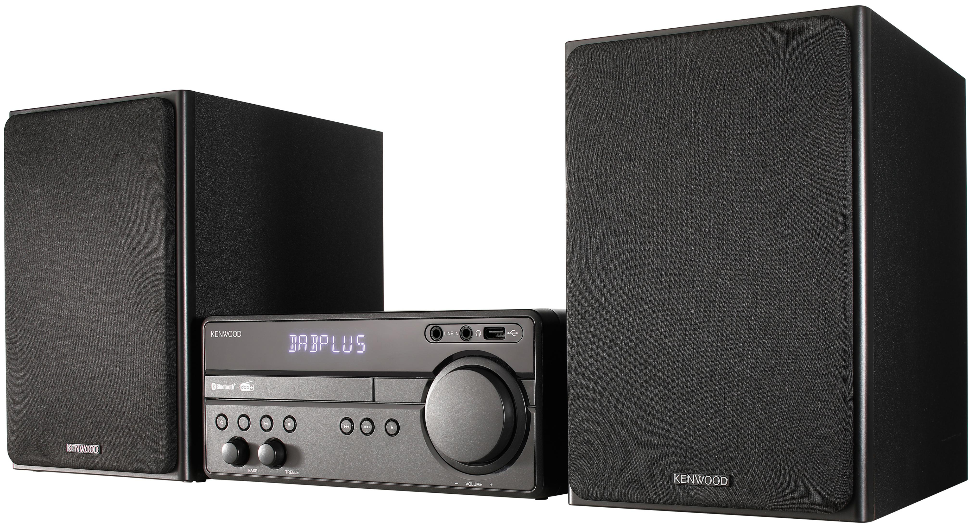 Sistema de audio Kenwood negro con altavoces, pantalla DAB y mandos de control. Fondo blanco.