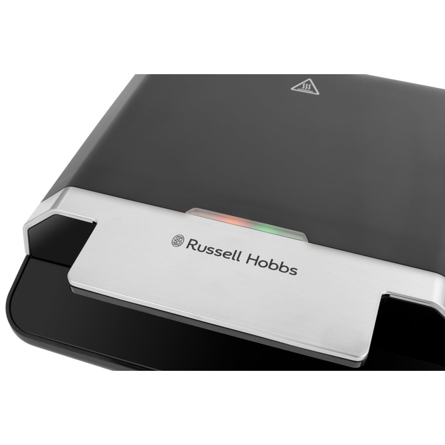 Close-up of a black and silver sandwich maker. Russell Hobbs logo.