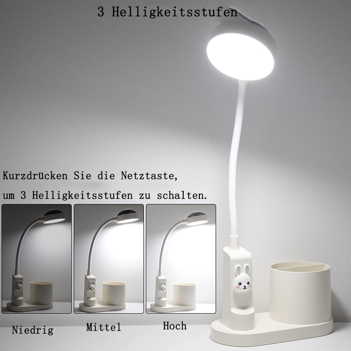 Weiße Schreibtischlampe mit Hasenfuß, drei Helligkeitsstufen und Text auf Deutsch.
