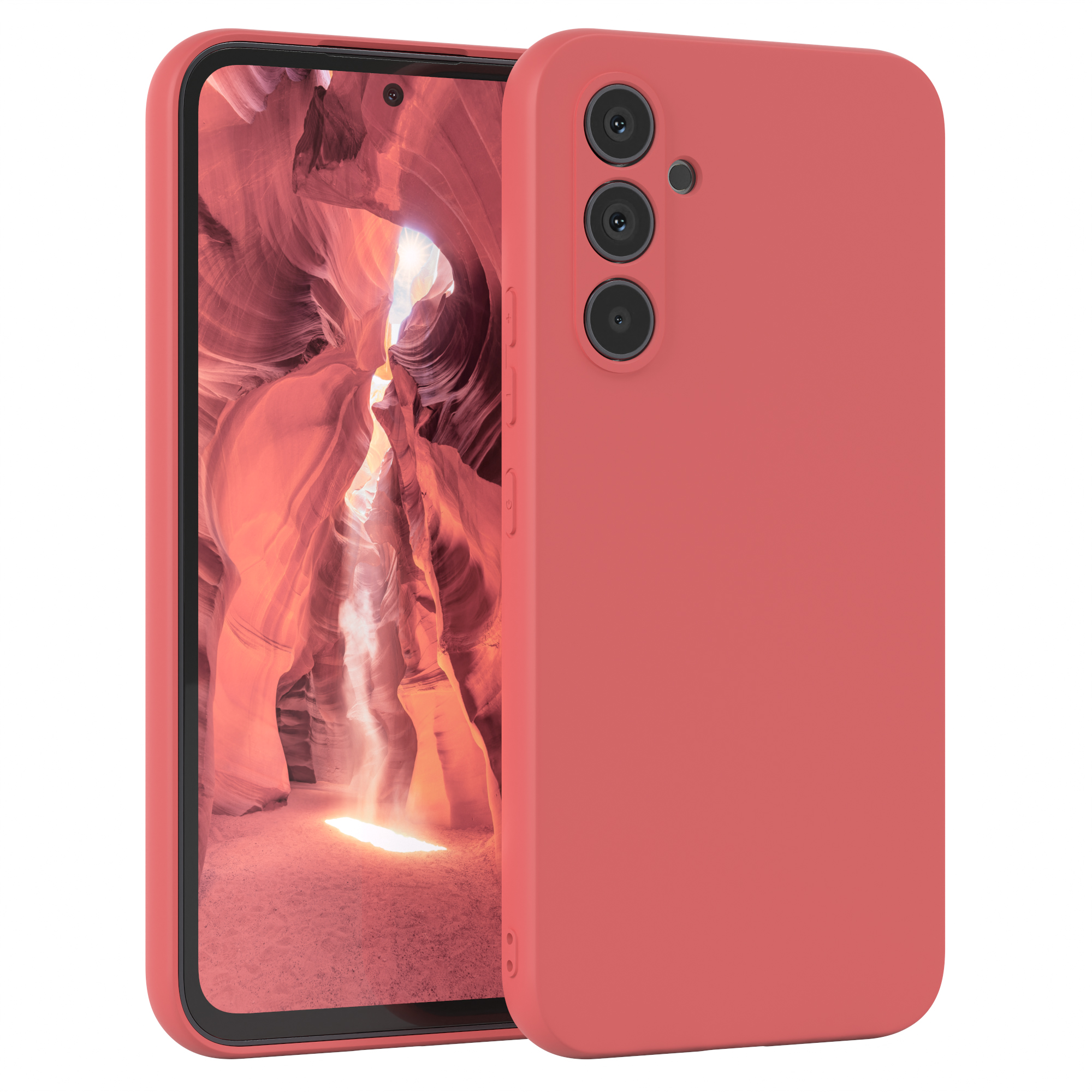 Eine korallenfarbene Handyhülle liegt neben einem Telefon, das einen Canyon zeigt.