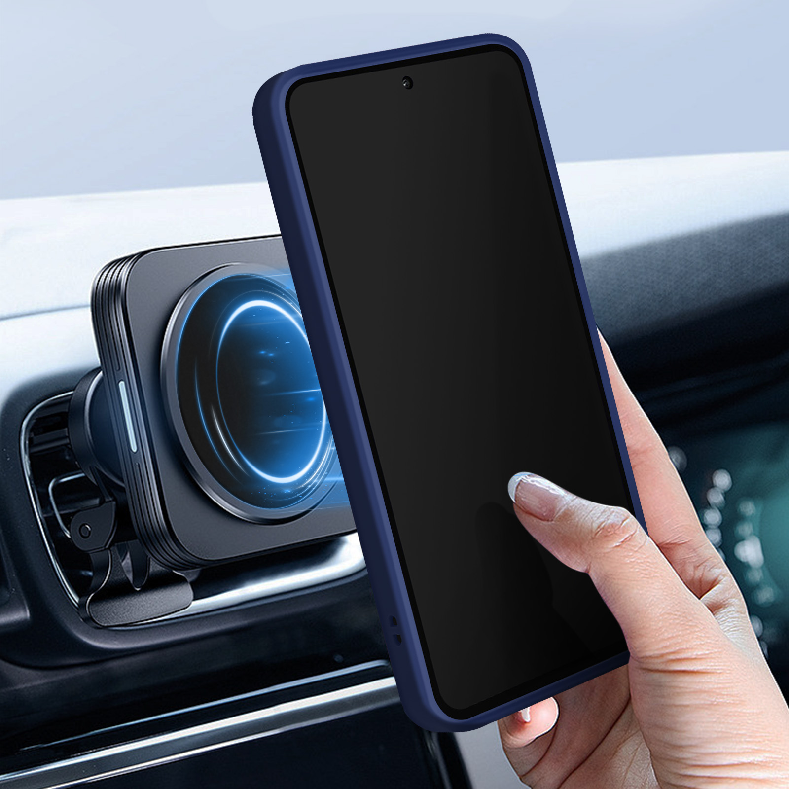 Una mano tiene un telefono blu accanto a un supporto magnetico per auto. Il telefono ha uno schermo nero.