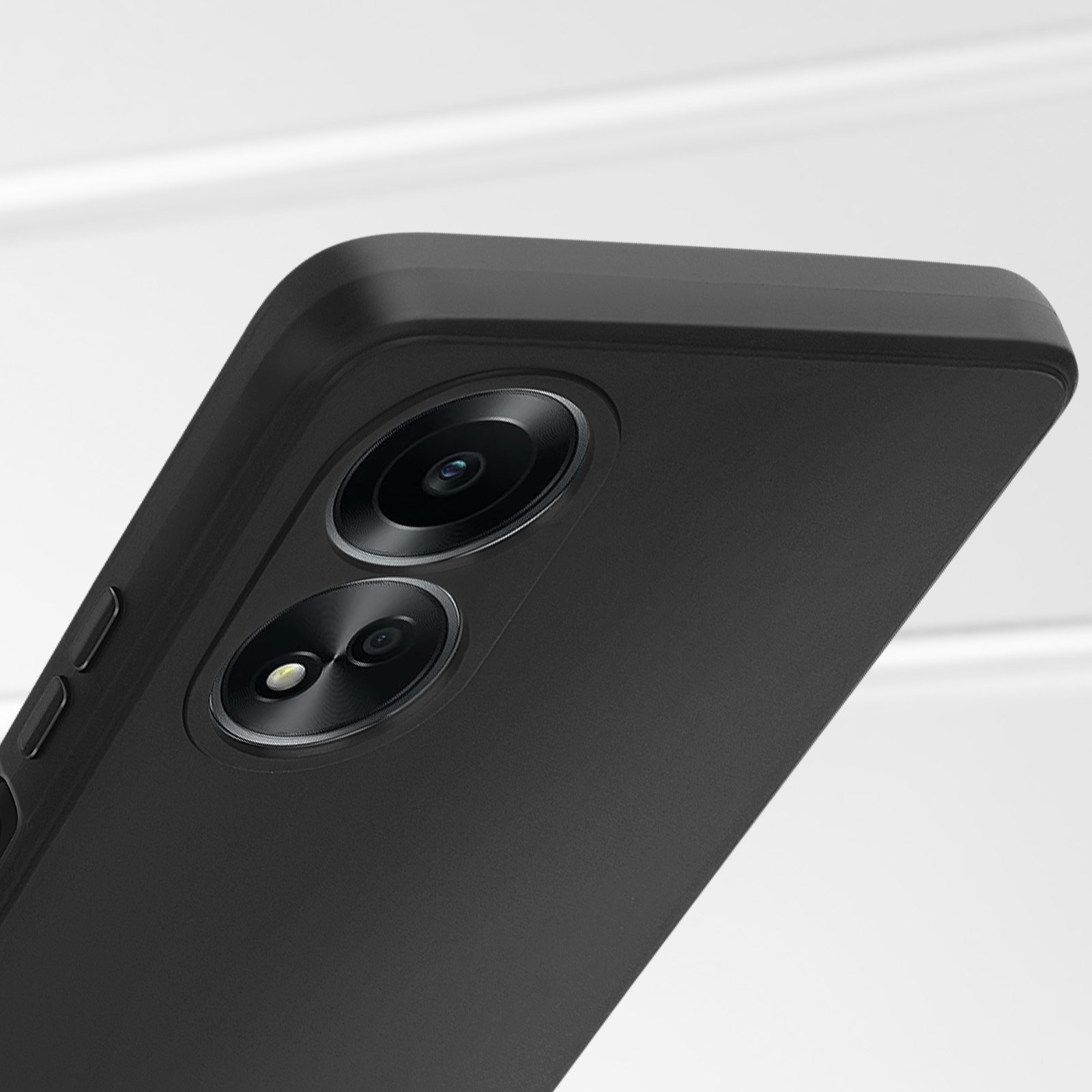 Primo piano di un telefono nero con due obiettivi della fotocamera sul retro. Il telefono è elegante.