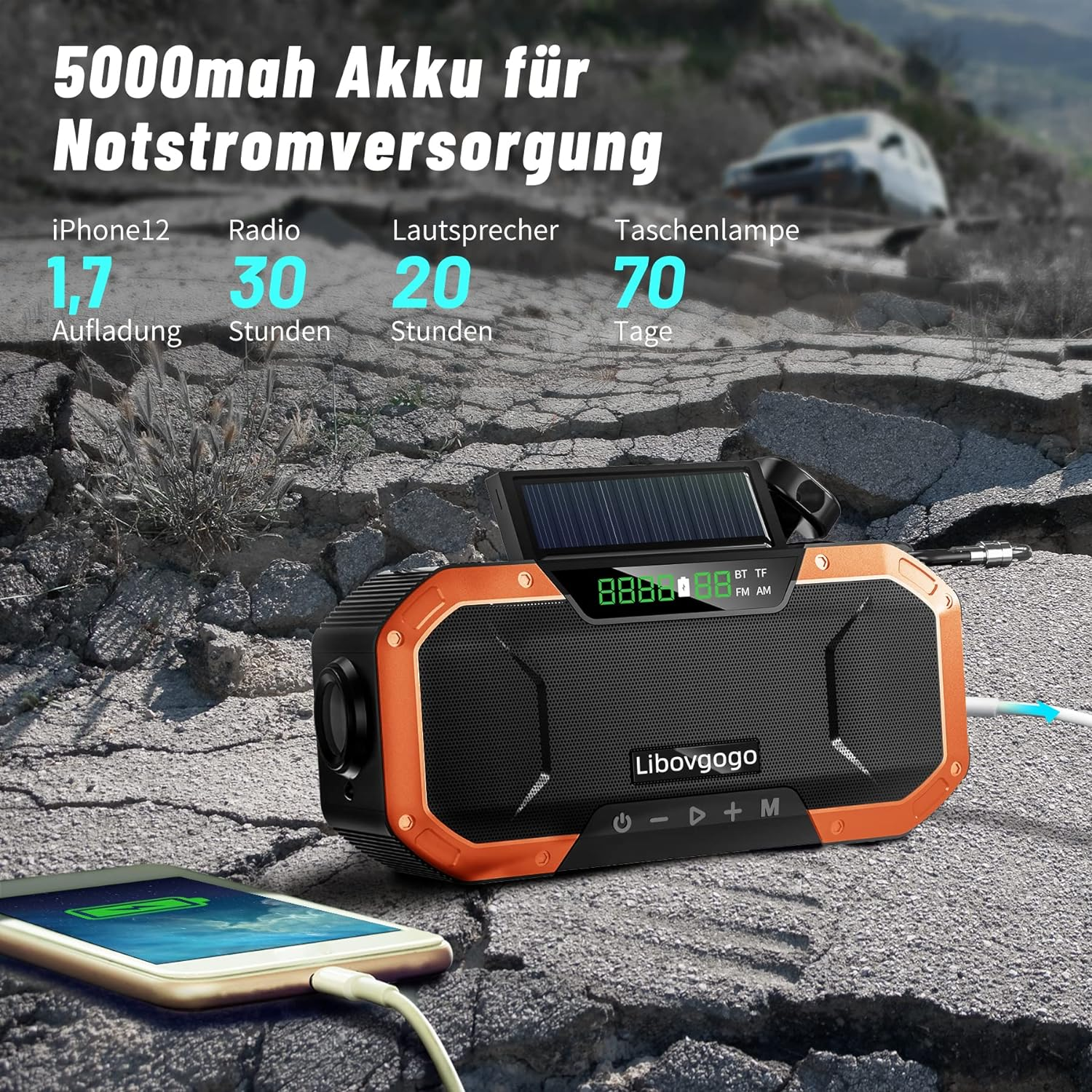 Orangener und schwarzer Lautsprecher mit Text. Telefon lädt links.