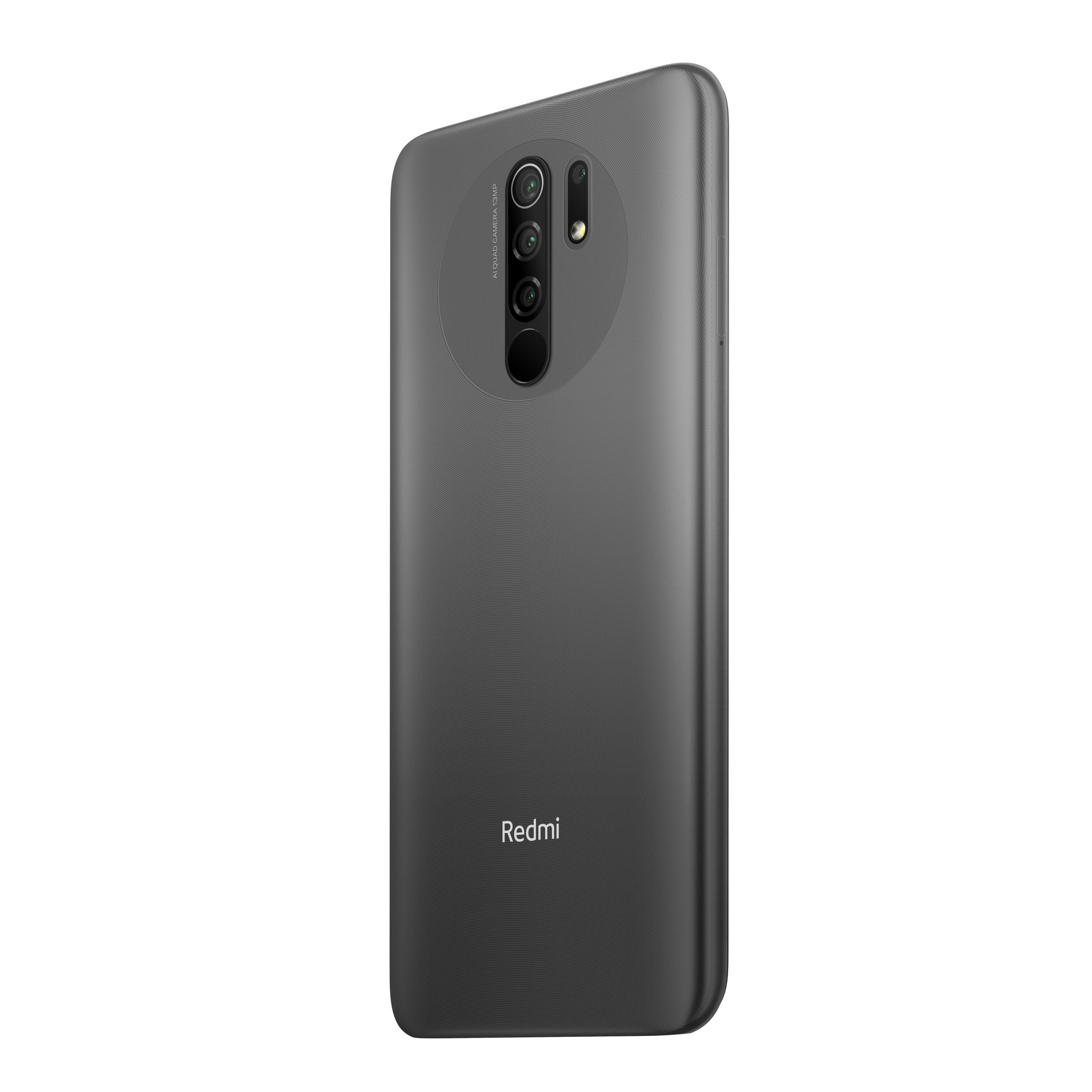 Ein graues Smartphone. Die Rückseite des Telefons ist sichtbar und hat eine Kamera mit dem Redmi-Logo darunter.
