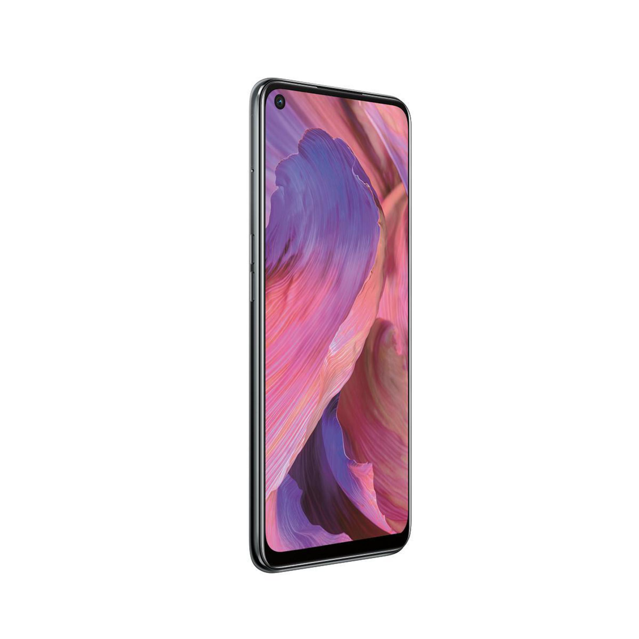 Smartphone vert avec écran affichant des formes abstraites roses et violettes.