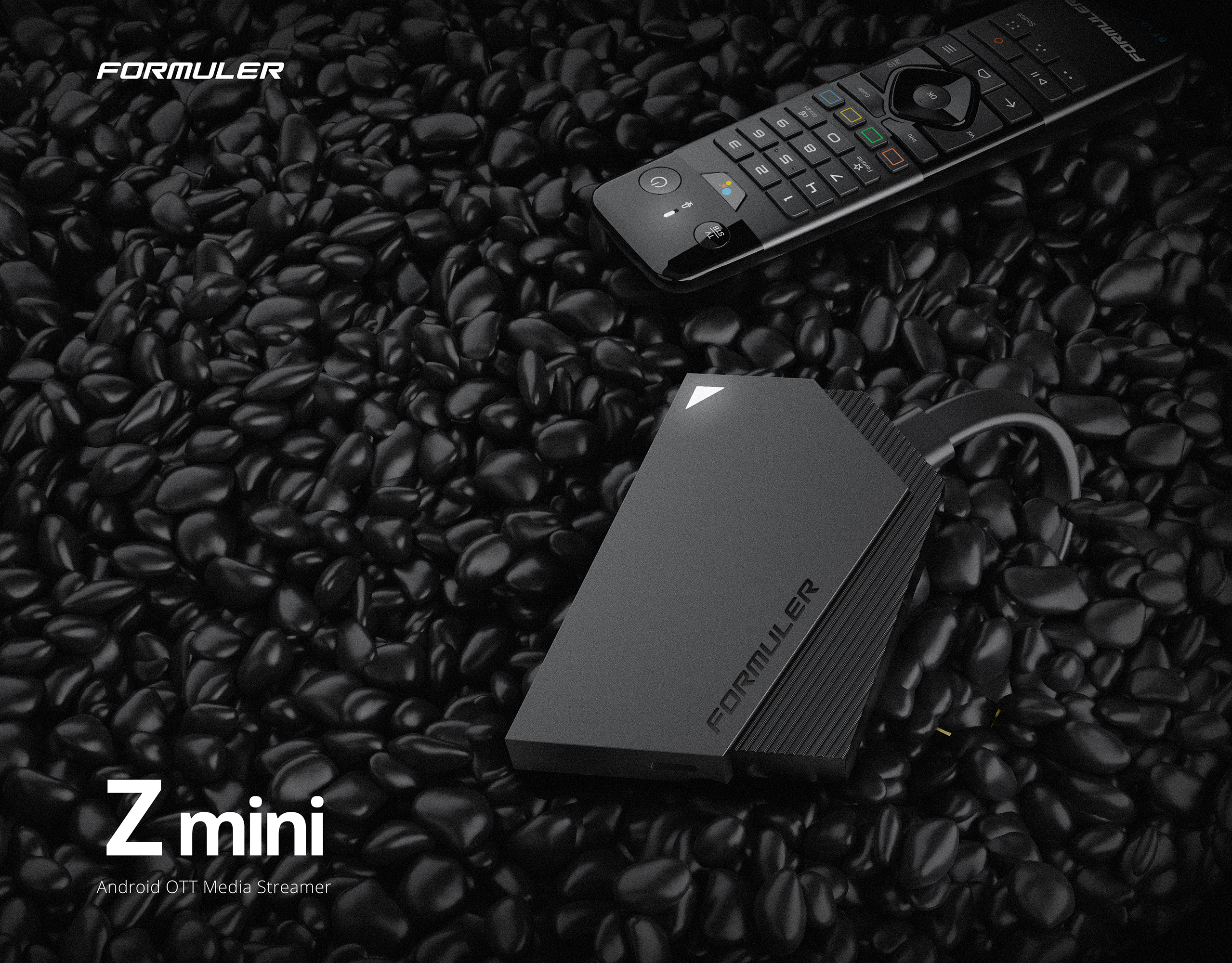 Schwarzer Formuler Z mini Media-Streamer, Fernbedienung auf schwarzer Kieseloberfläche. Text 'Z mini'.