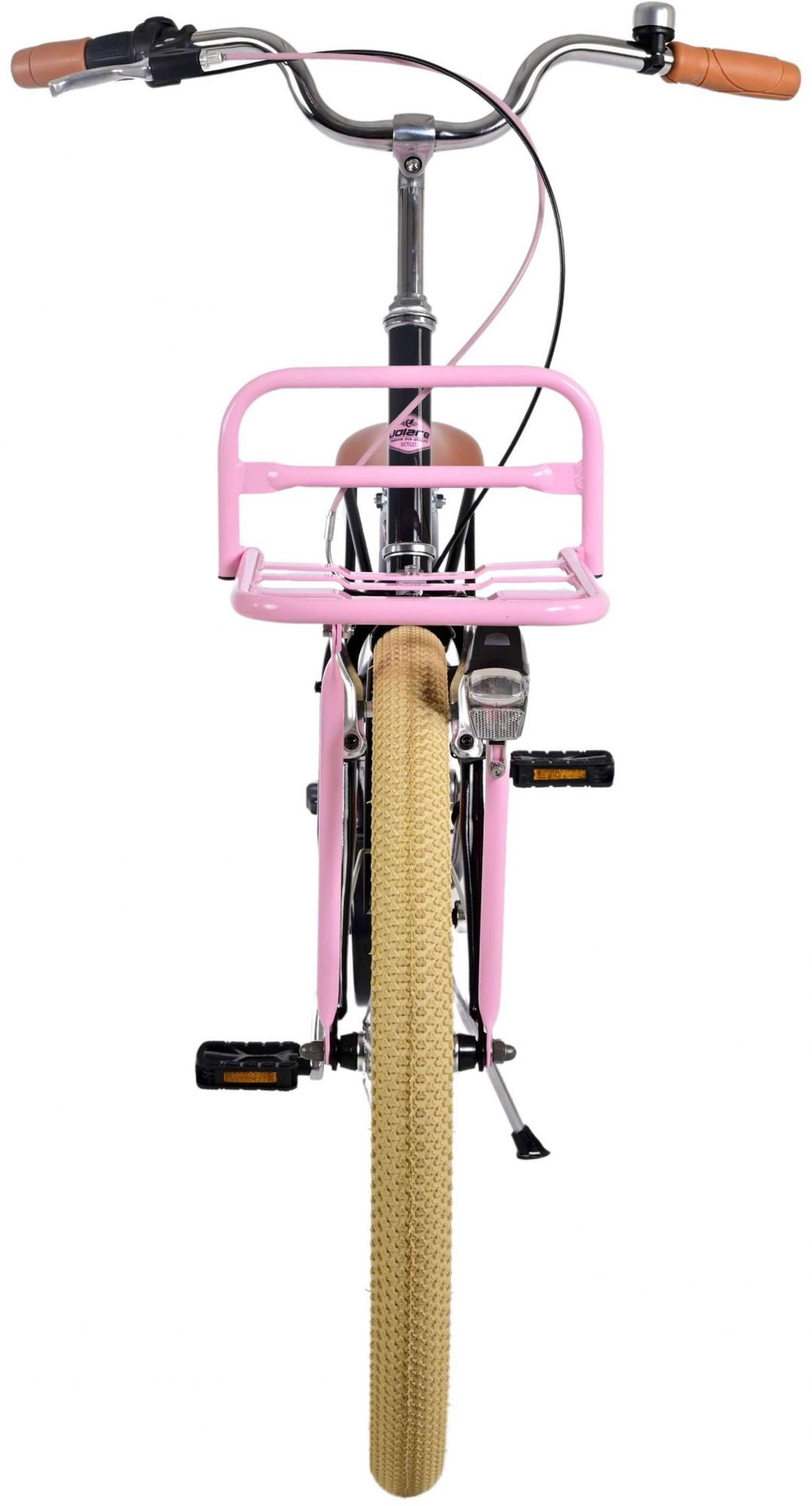 Rosa Fahrrad von vorne, Korb, beiger Reifen, Chromgriff und Klingel.