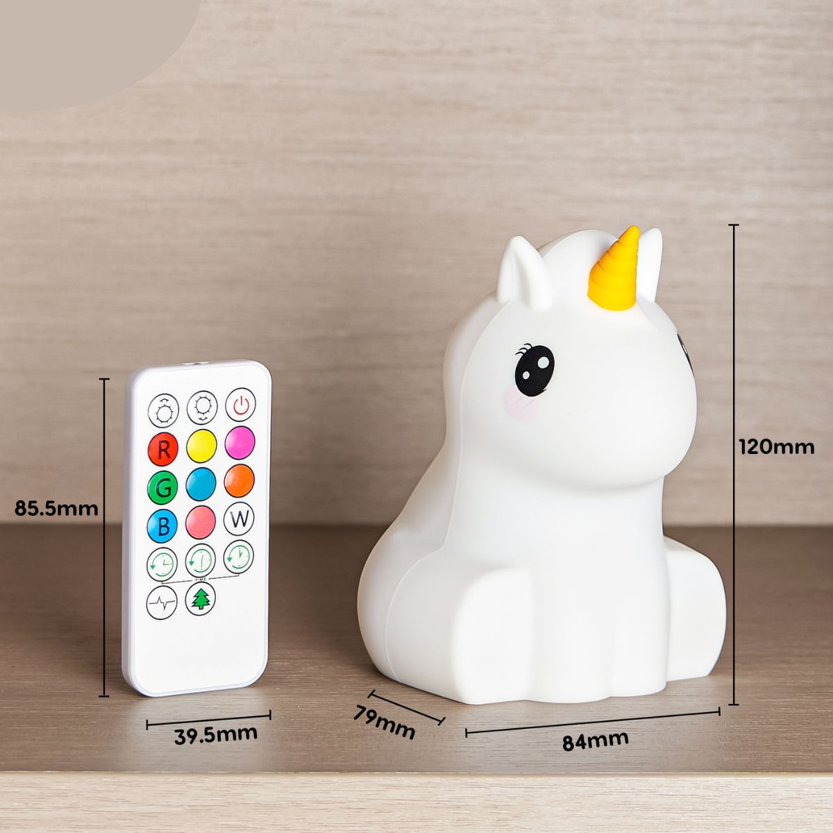Luz de noche de unicornio y mando a distancia. Dimensiones 120 mm, 84 mm y 79 mm.