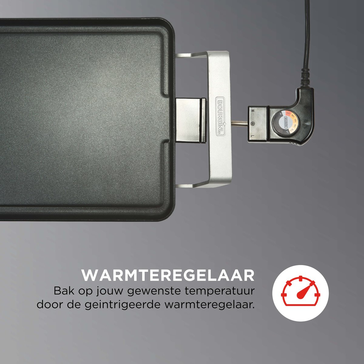 A black cooking appliance with a temperature control, with a red dial on a grey surface.