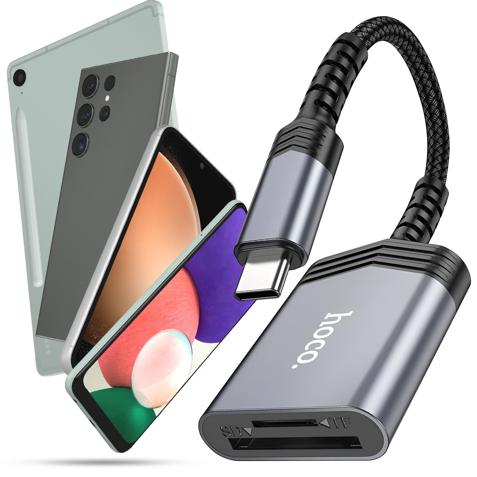 Dispositivi e un lettore di schede grigio. Telefoni, tablet e un lettore di schede con slot SD e TF.