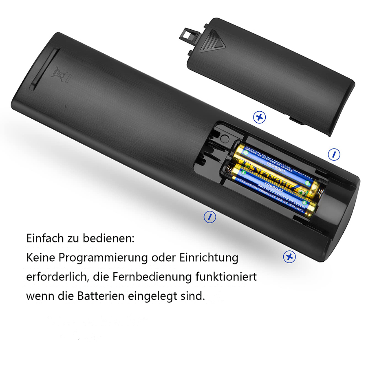 Schwarze Fernbedienung mit offenem Batteriefach, Batterien sichtbar.