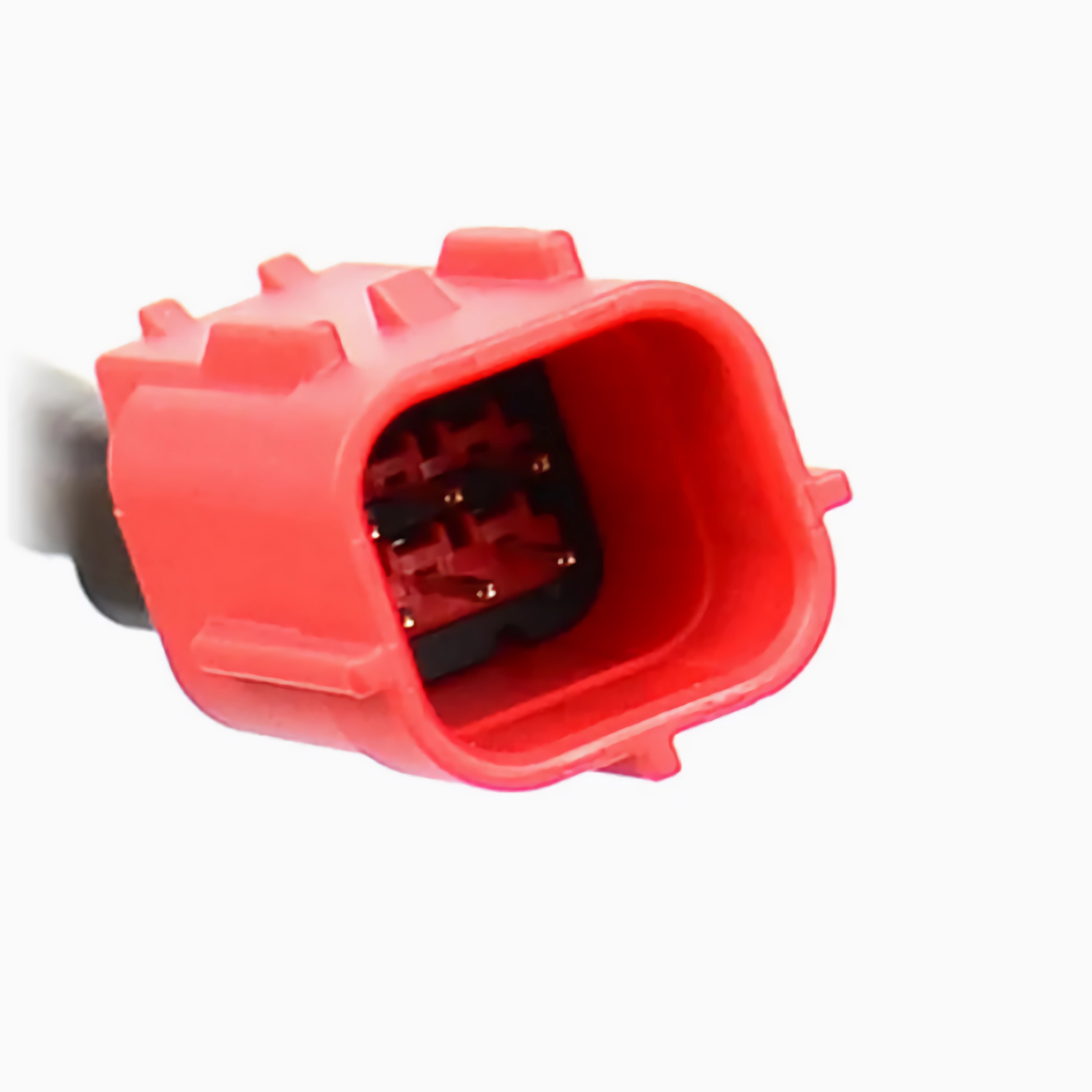 Ein roter rechteckiger elektrischer Stecker mit mehreren Stiften, isoliert auf weißem Hintergrund.