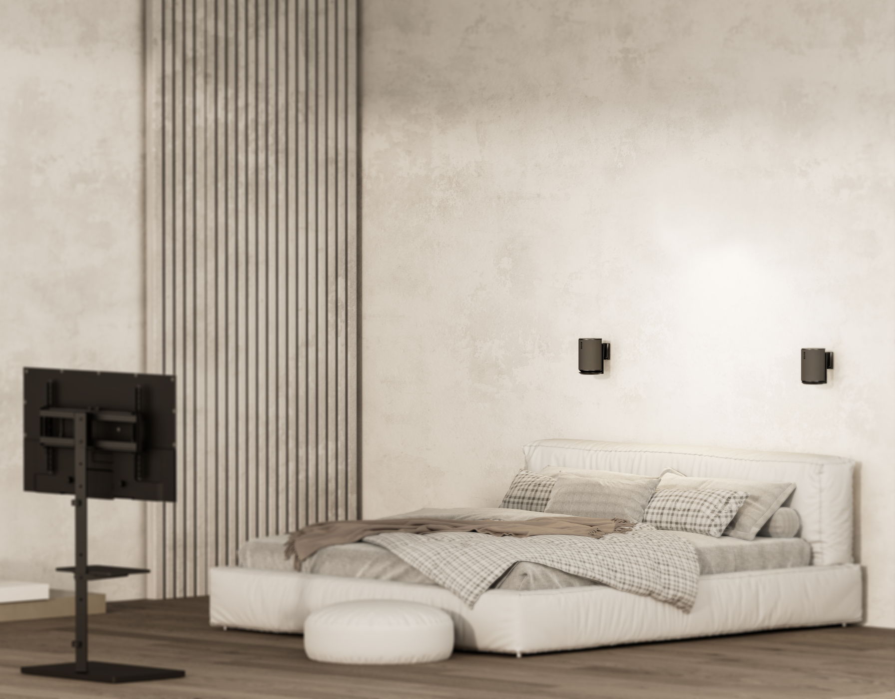 A bedroom with a bed, a TV stand, and wall lights. The room has wooden floors and a textured wall.