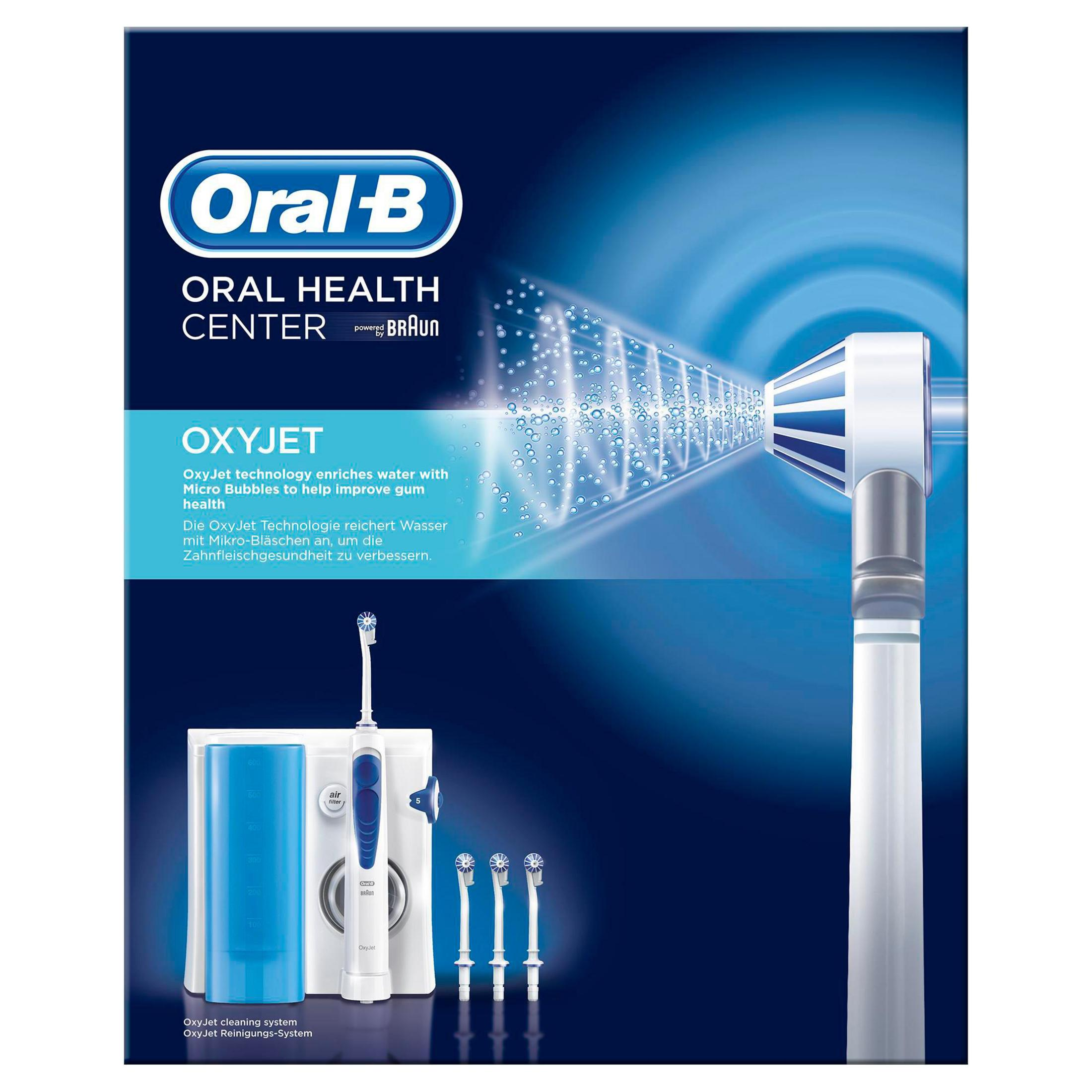 Oral-B Oxyjet Reinigungssystem mit Zahnbürste und Munddusche, blauer Hintergrund.