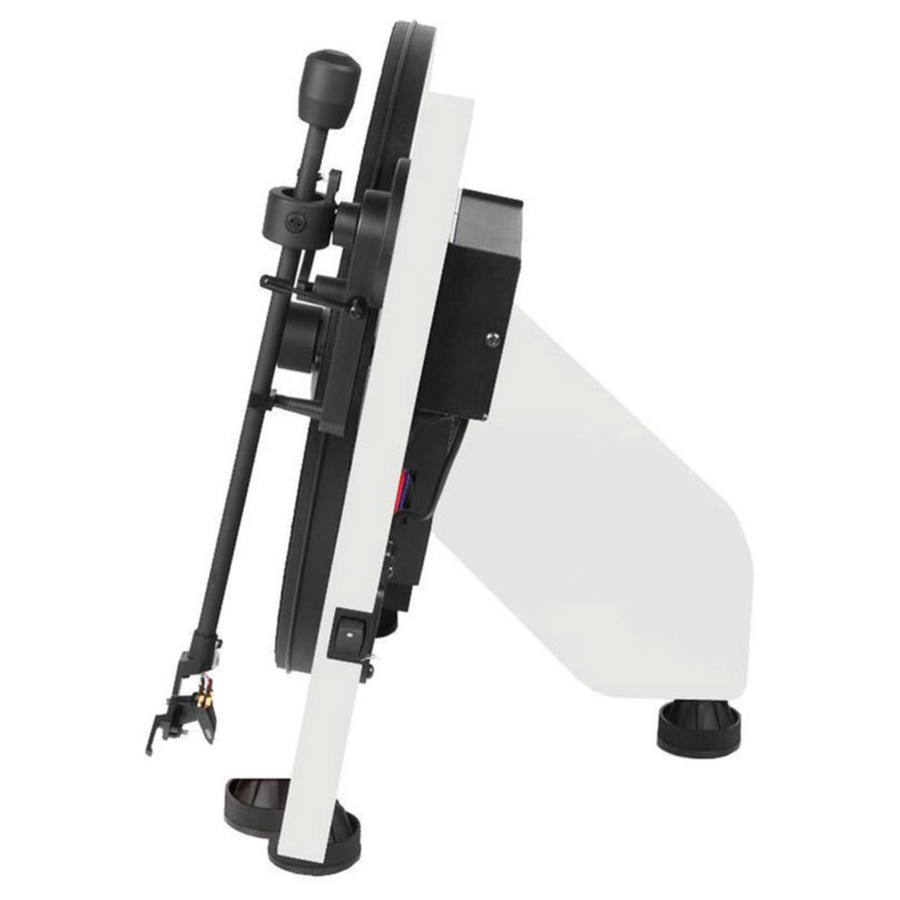 Side view of a white and black machine on a white surface.