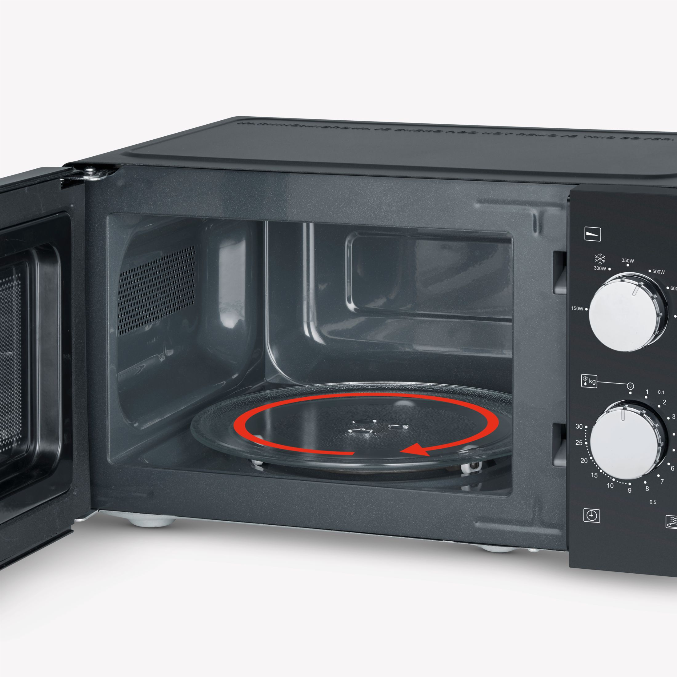 Four à micro-ondes noir ouvert avec une plaque de verre à l'intérieur. La plaque a une flèche rouge.
