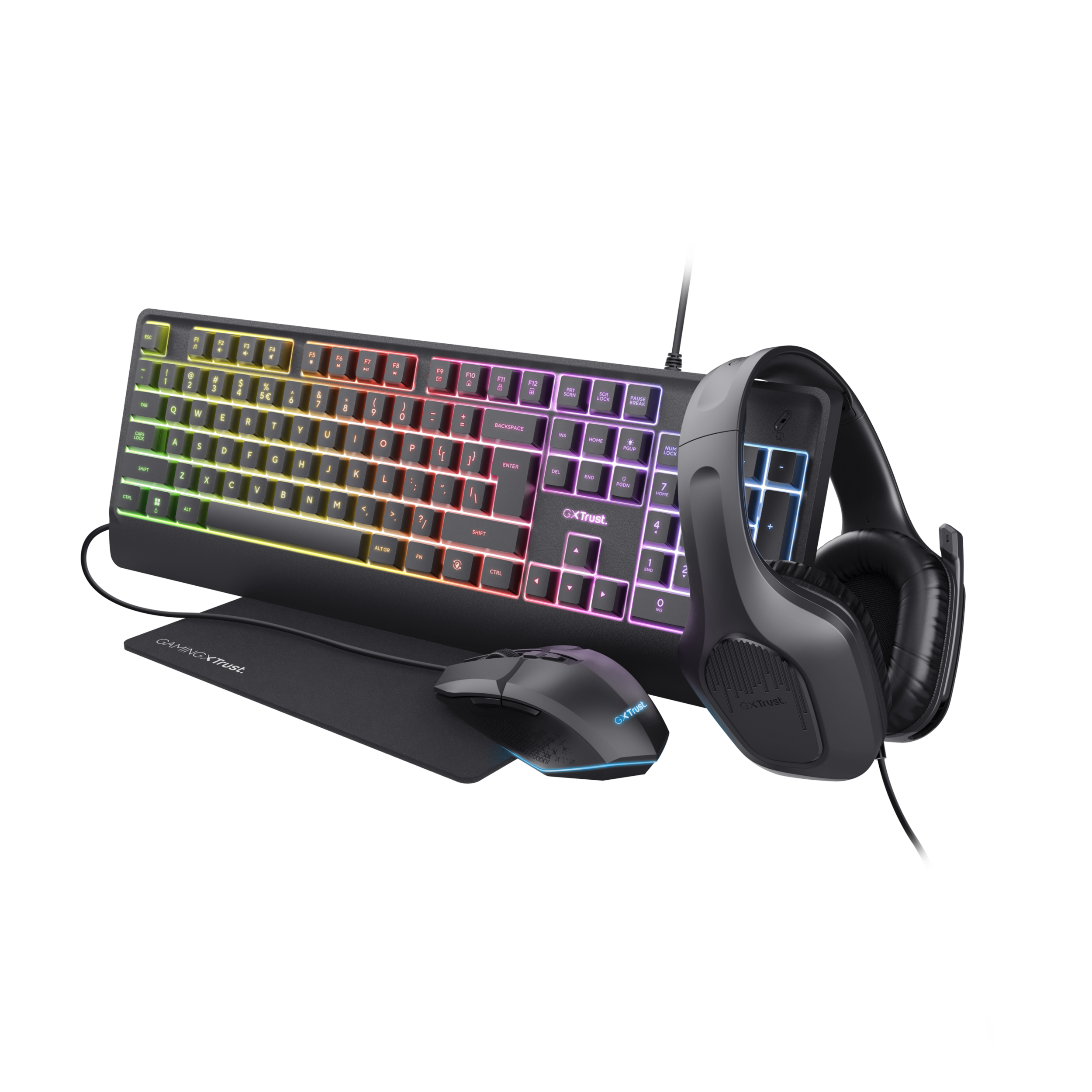 Gaming toetsenbord, muis en headset. Toetsenbord heeft regenboogverlichting. Zwarte muis en headset op zwarte achtergrond.