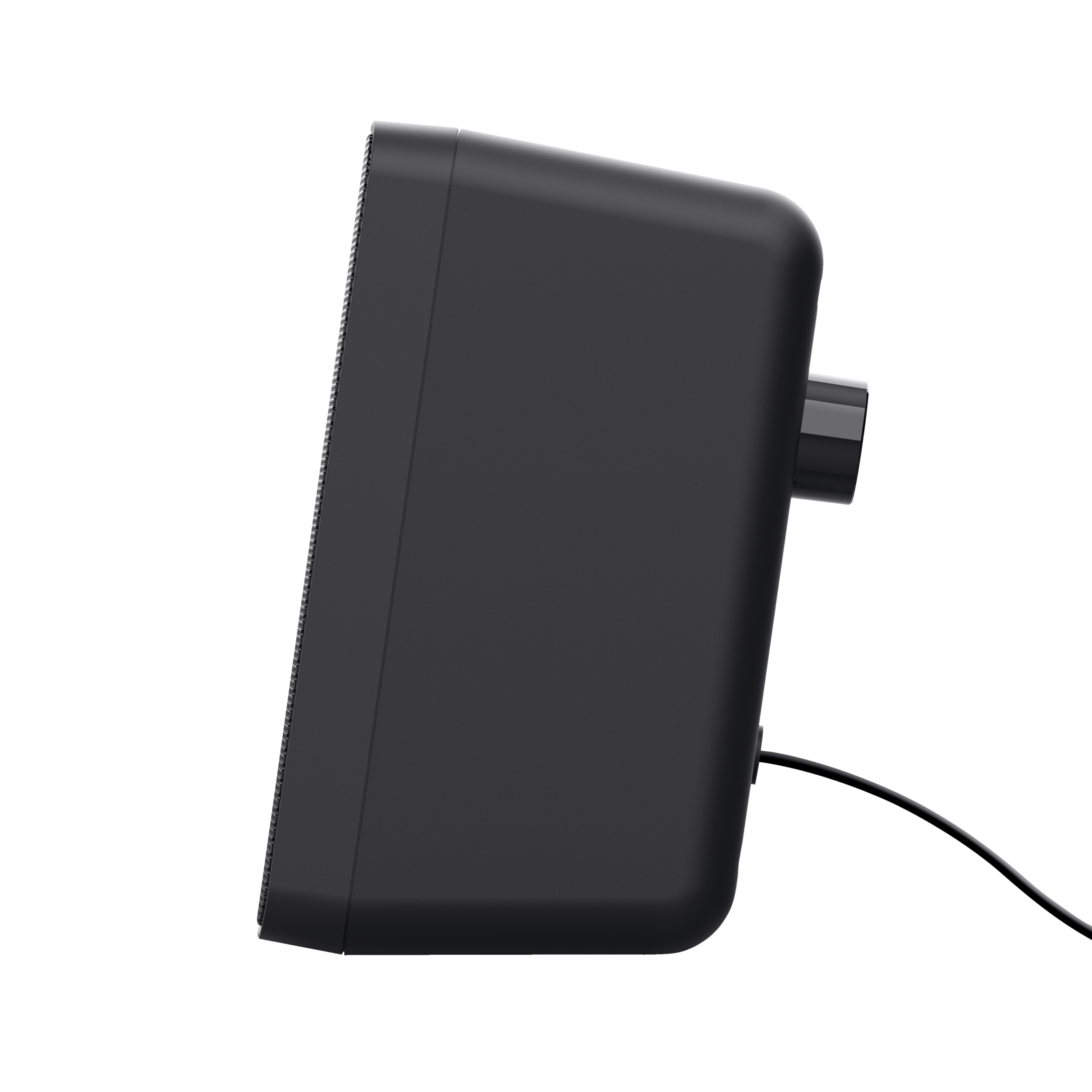 Czarny głośnik z pokrętłem głośności z boku. Czarne tło. Widok z boku.