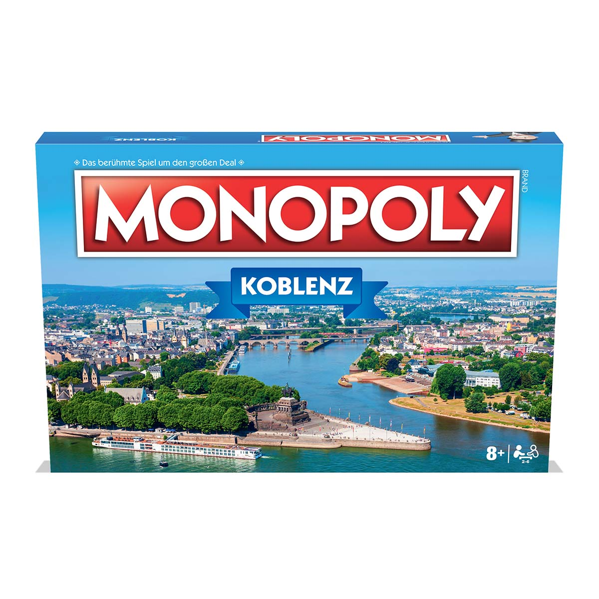 Monopoly-Brettspielbox mit Stadtansicht mit Fluss und Brücke.