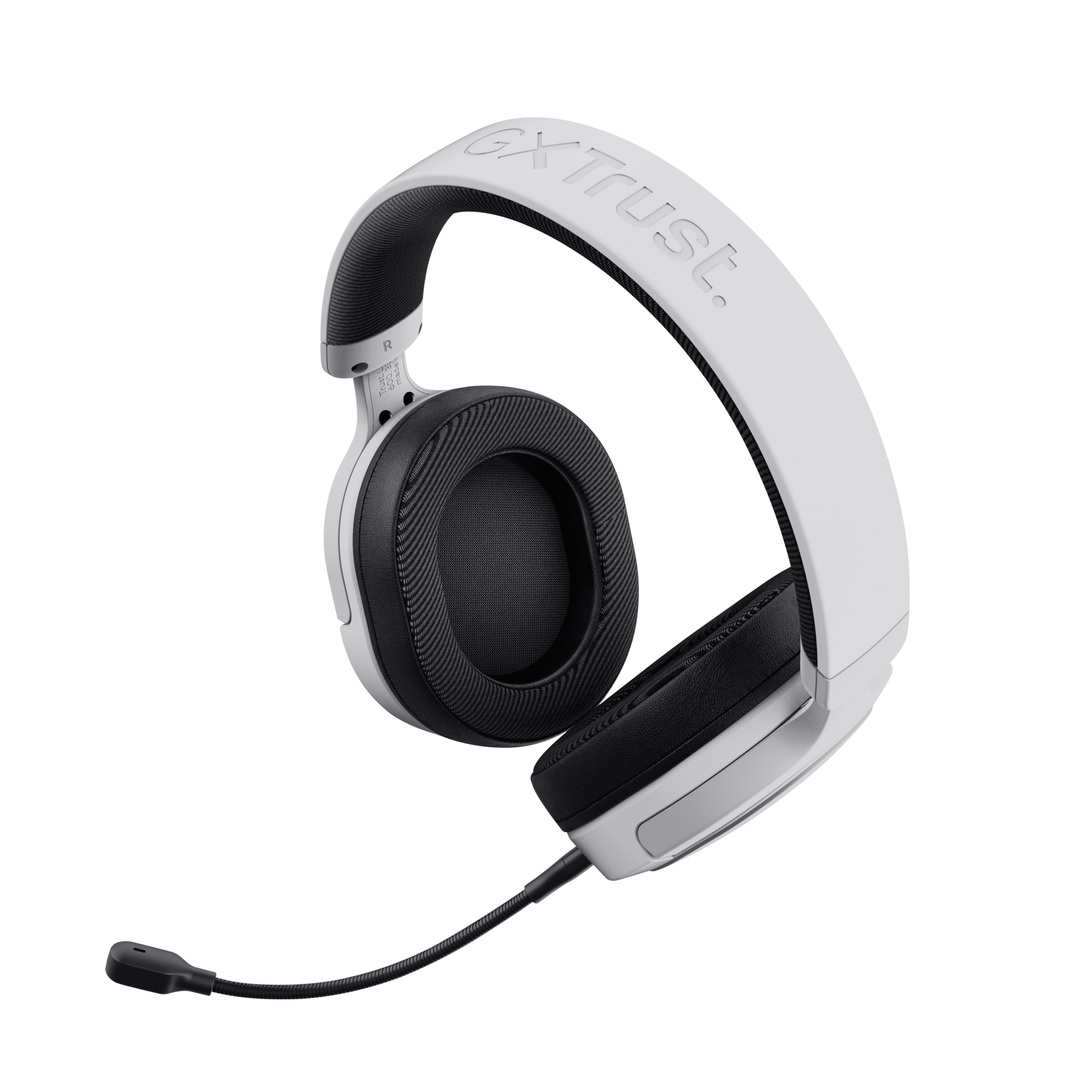 Casque de jeu blanc et noir avec microphone, isolé sur fond noir.