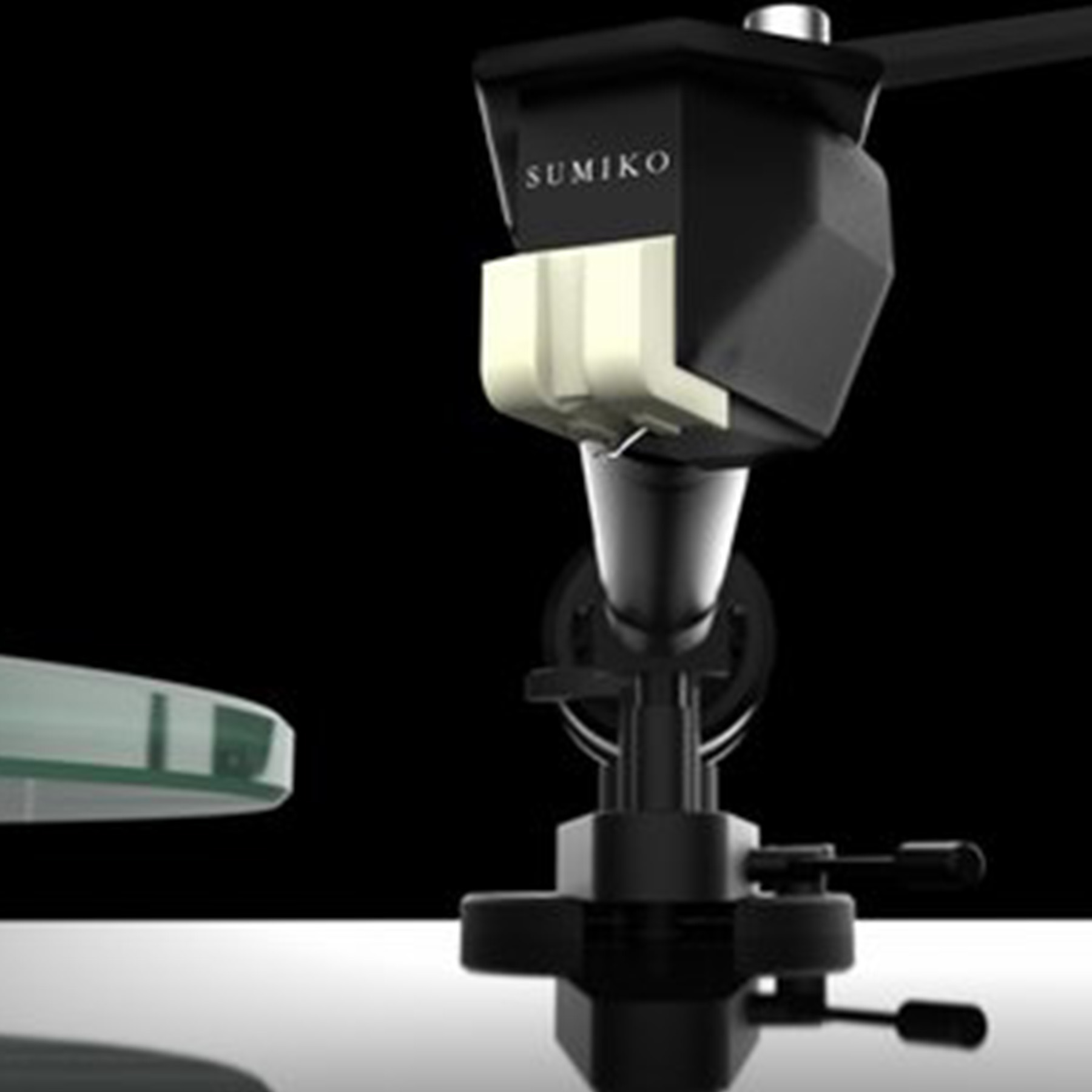 Close-up of a black turntable cartridge with the brand name SUMIKO.