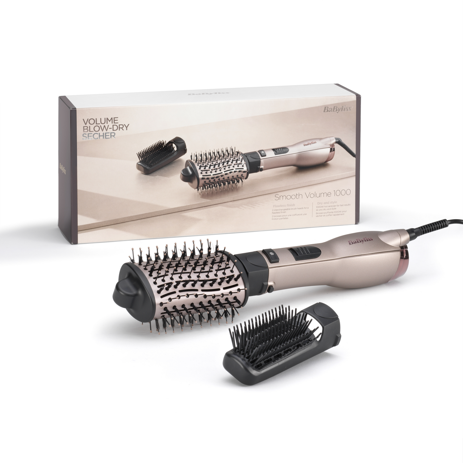 Un styler coiffant BaByliss doré avec deux brosses et sa boîte.