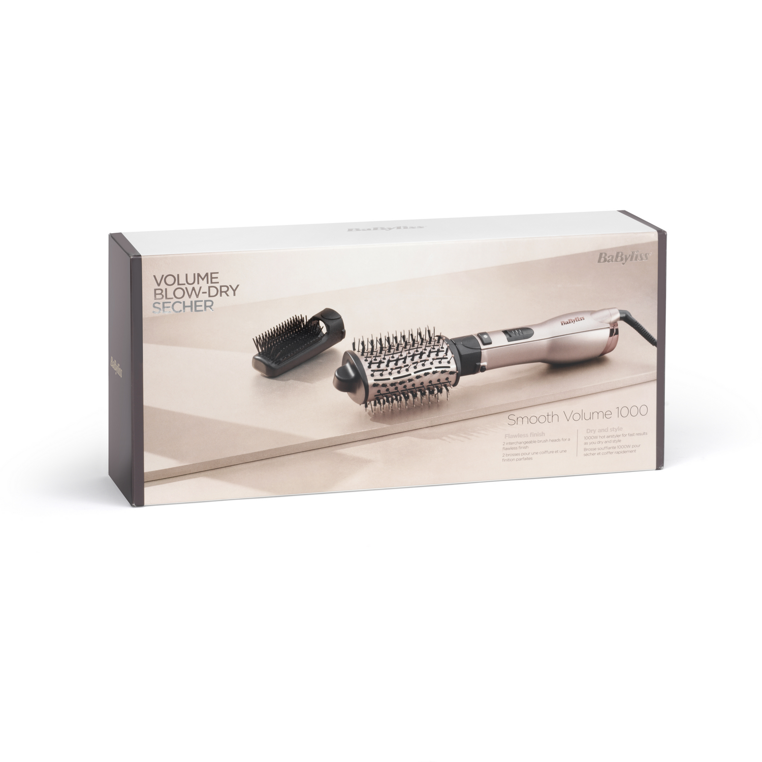 Emballage d'un styler BaByliss Smooth Volume 1000 avec deux têtes de brosse.