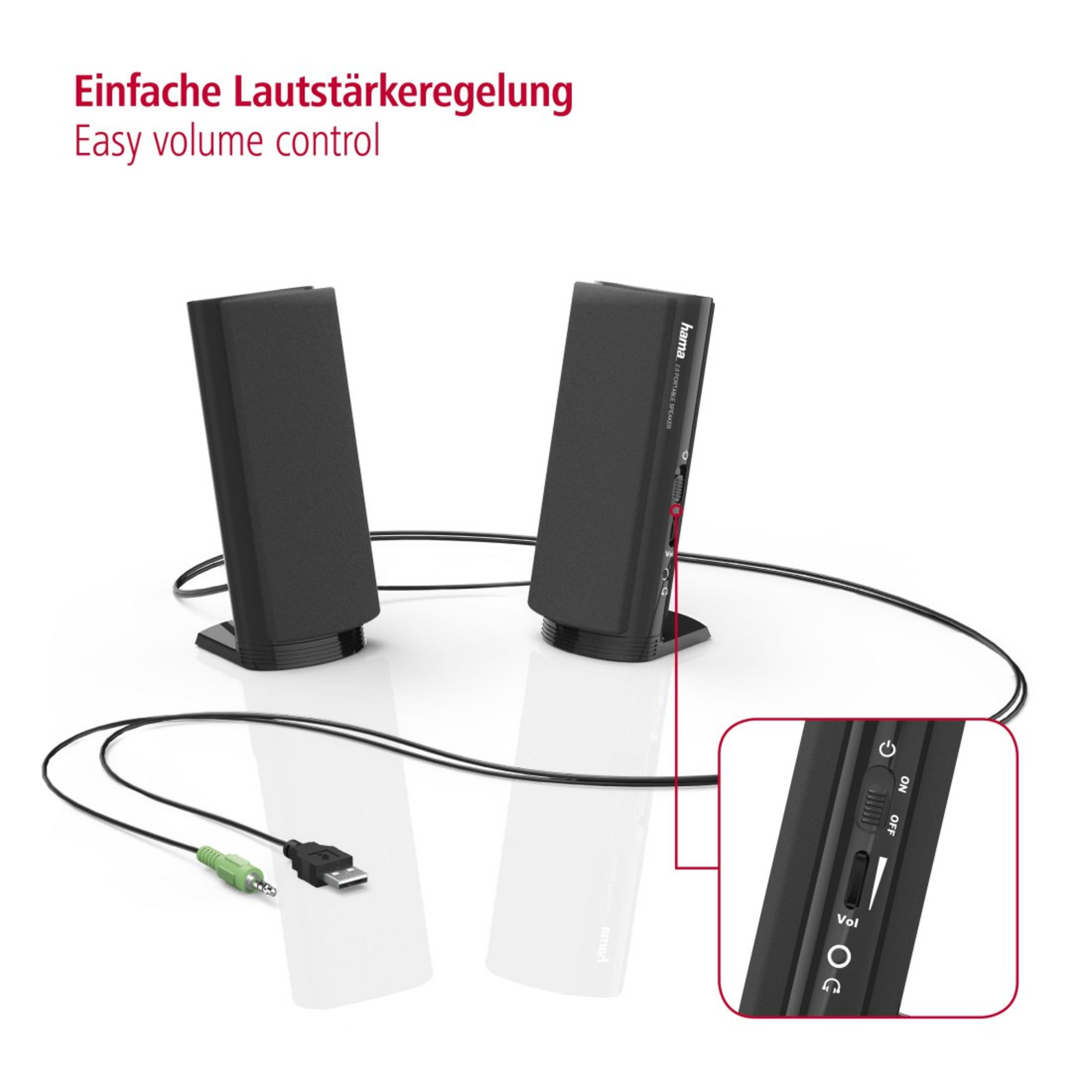 Zwei schwarze Lautsprecher mit Lautstärkeregelung und ein schwarz-grünes Kabel.