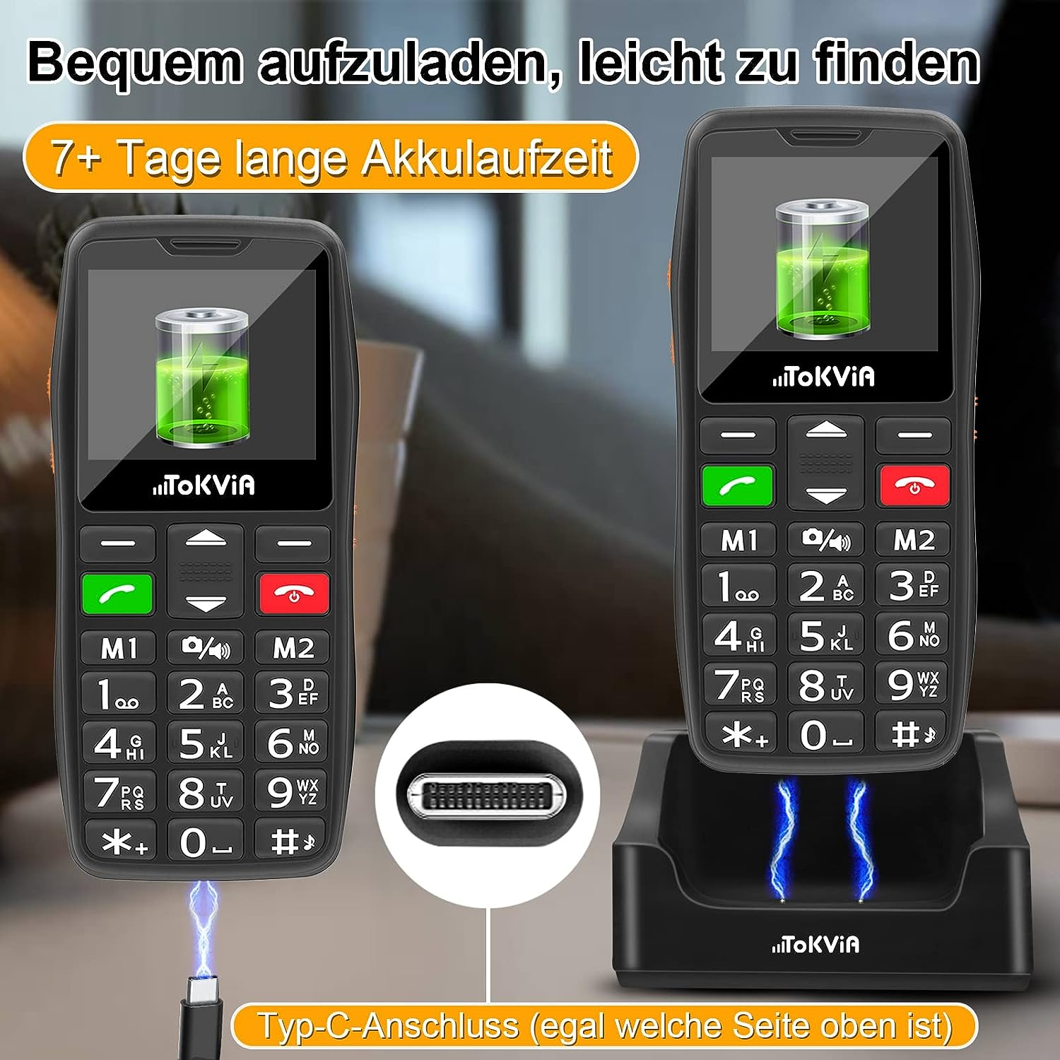Zwei schwarze Handys, eine Ladestation und ein USB-Kabel.