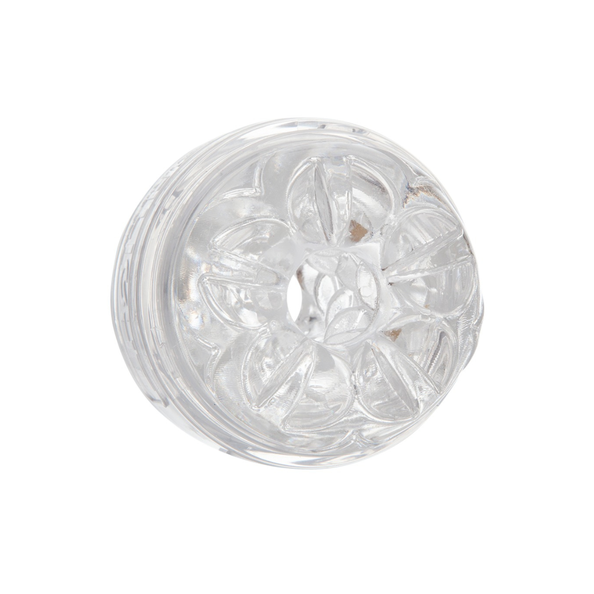 Przezroczysta, teksturowana zabawka erotyczna. Ma owalny kształt ze skomplikowanymi wewnętrznymi wzorami.