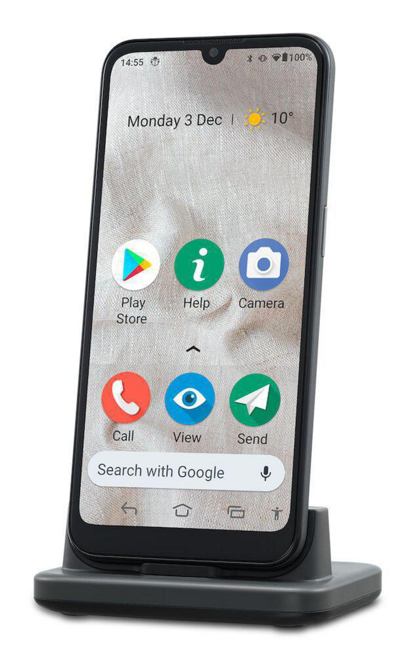 Ein Smartphone auf einem Ständer, das einen Startbildschirm mit App-Symbolen und Datum anzeigt.
