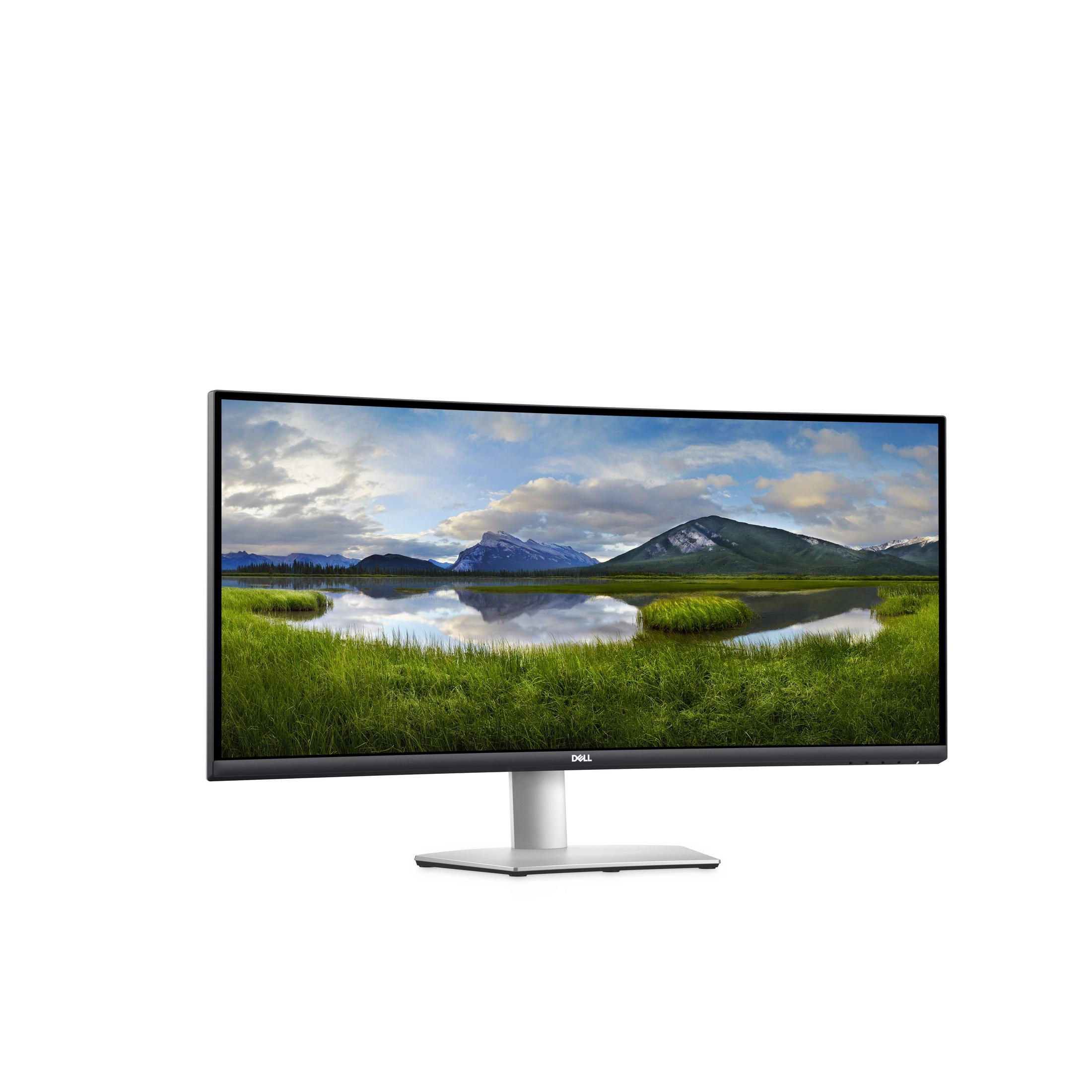 Dell-Monitor, der eine malerische Landschaft mit Bergen, Gras und einem bewölkten Himmel zeigt.