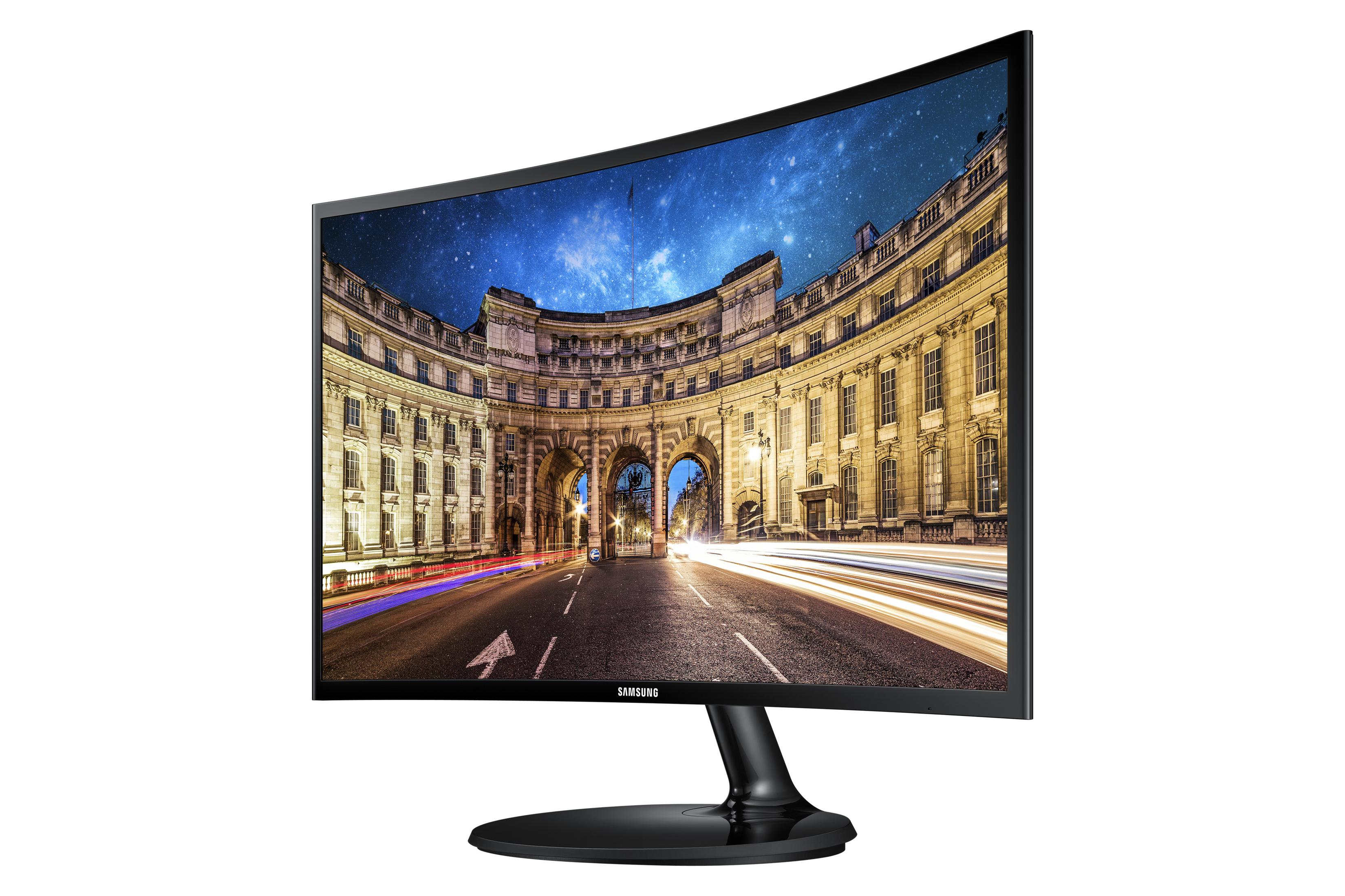 Un monitor per computer curvo che mostra un paesaggio urbano. Lo sfondo è uno studio bianco.