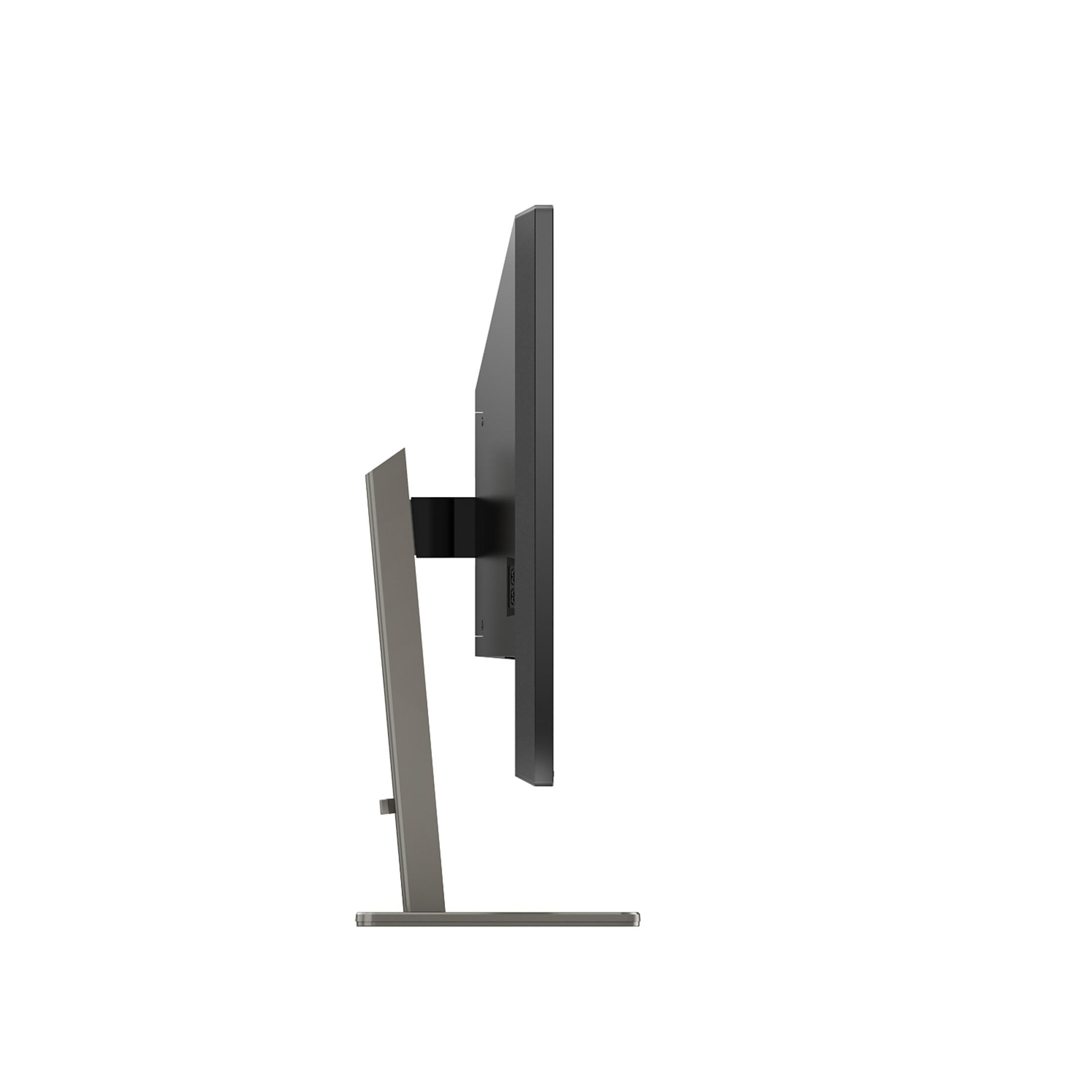 Widok z boku monitora, czarny ekran, ze srebrną podstawą na białym tle.