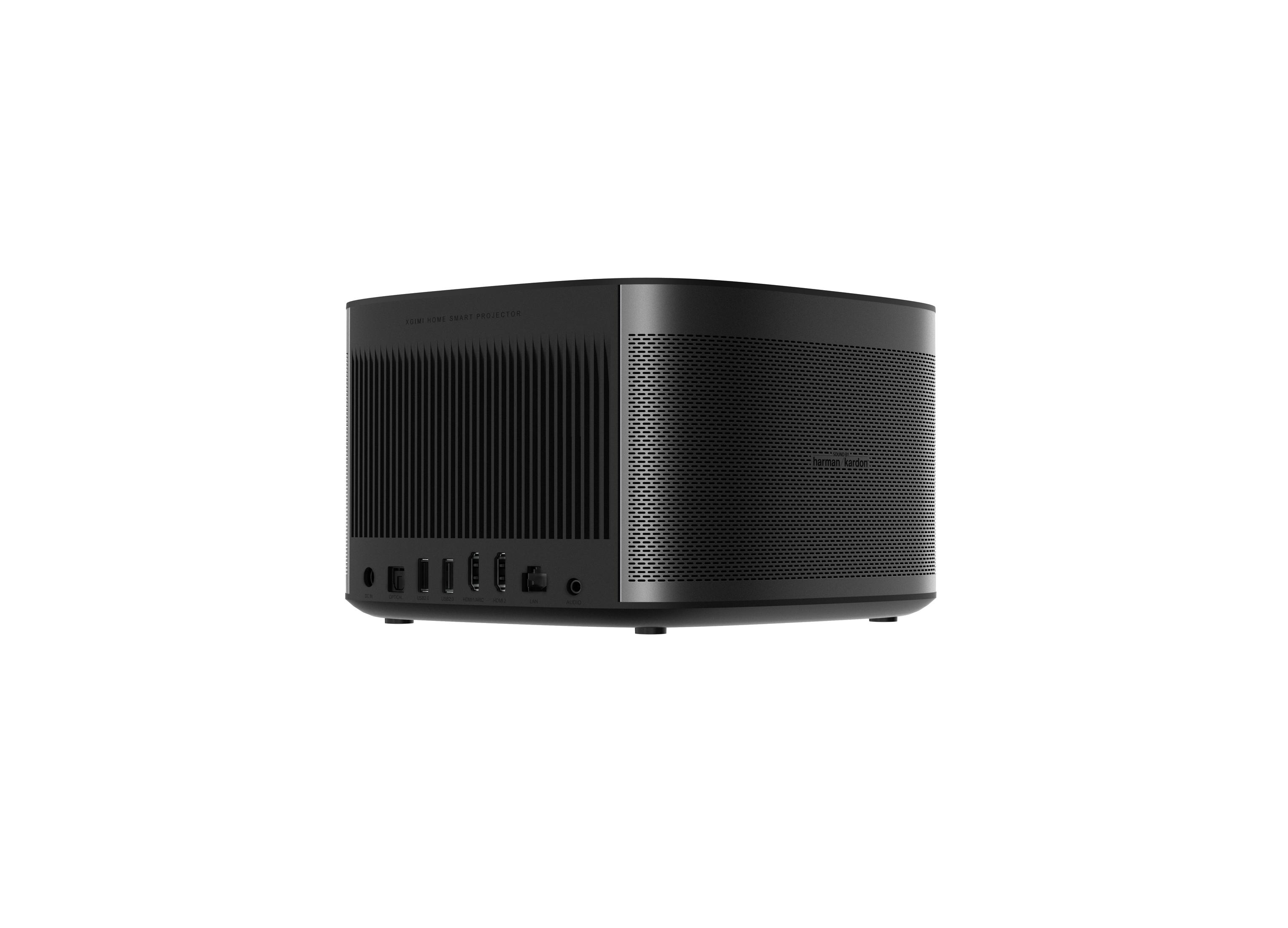 Un projecteur noir sur une surface blanche. Le projecteur a plusieurs ports et un design élégant.