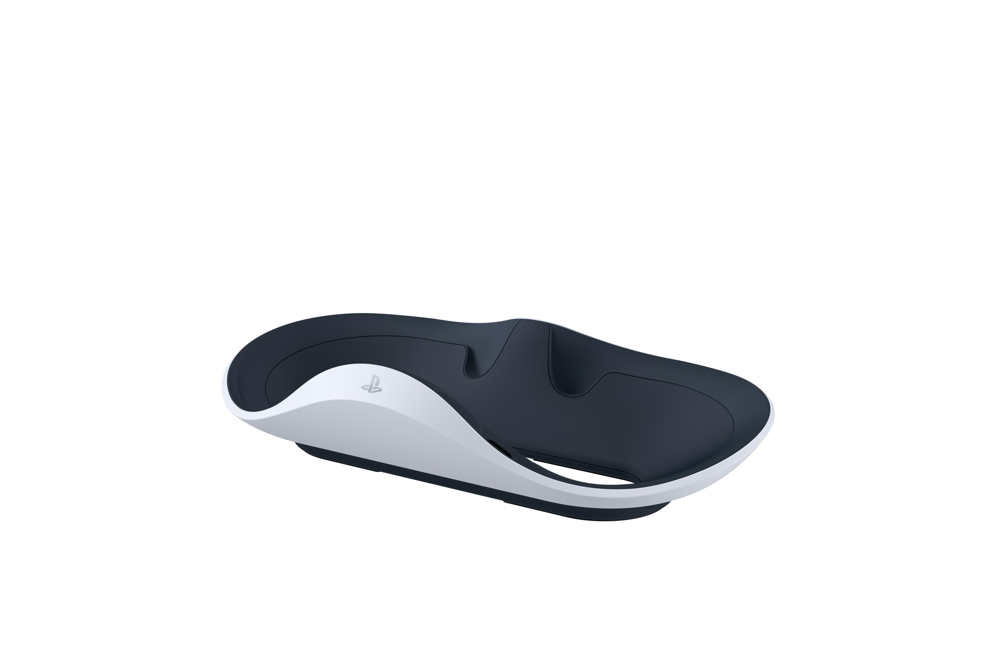 Stazione di ricarica DualSense PlayStation 5 bianca e nera su sfondo bianco.