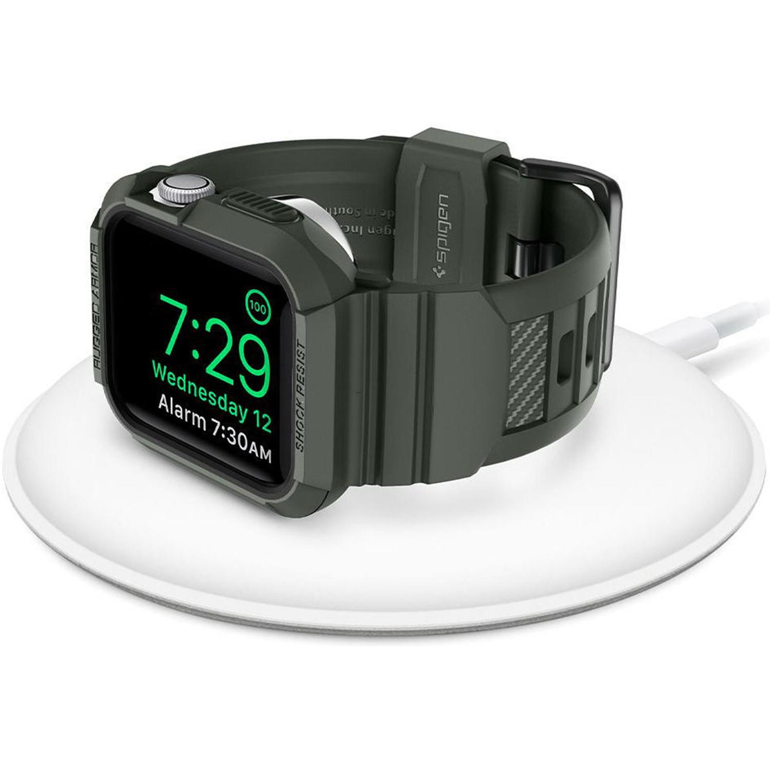 Smartwatch na stacji ładującej. Zegarek pokazuje godzinę: 7:29, środa 12, alarm 7:30.