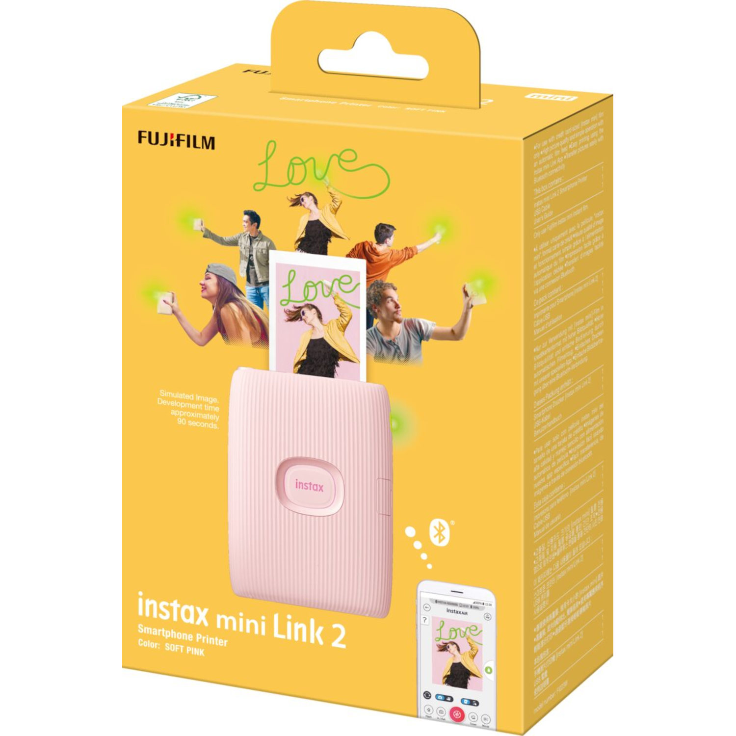 Różowe pudełko drukarki Instax Mini Link 2 z osobami korzystającymi z produktu.