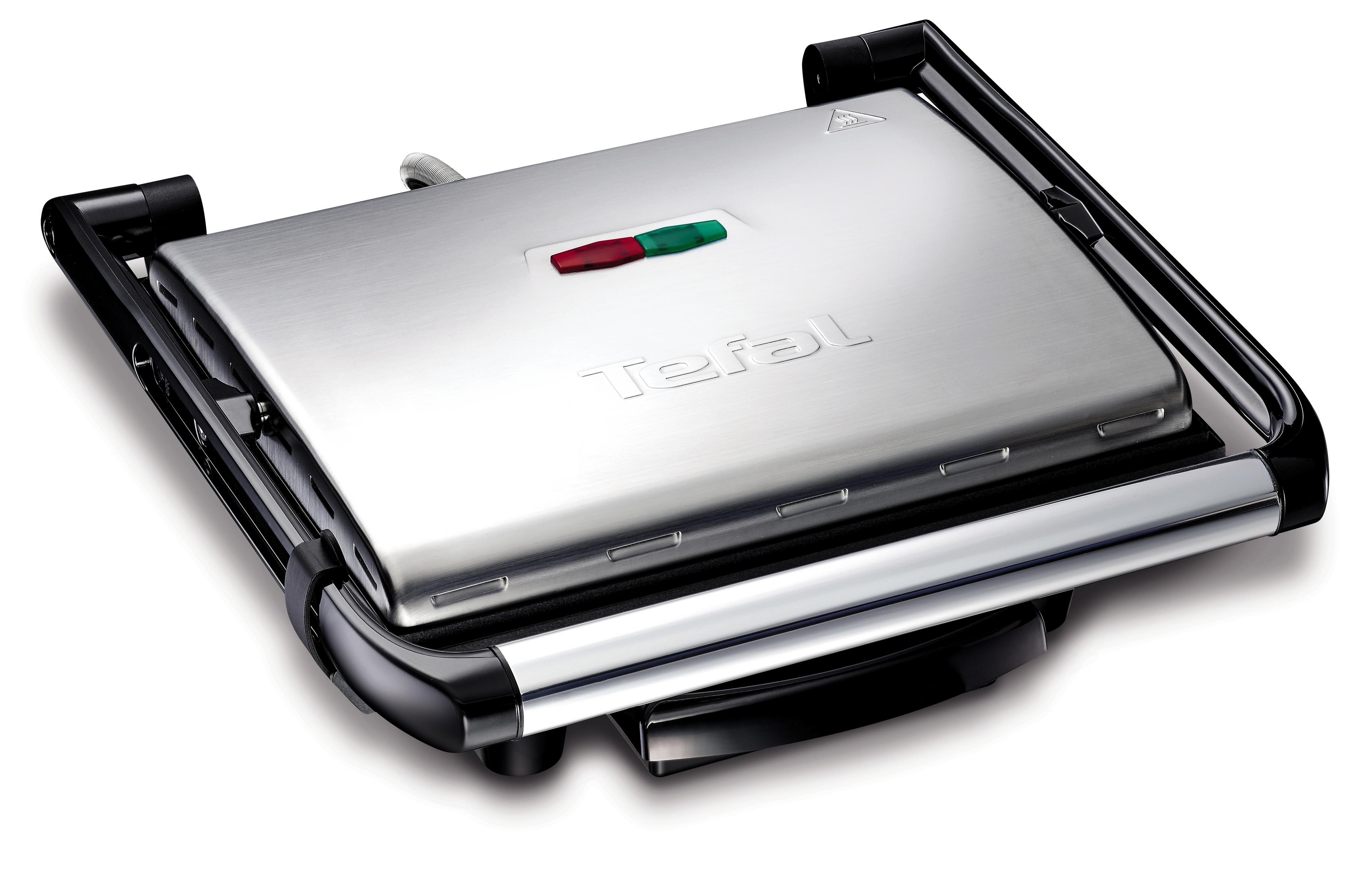 Parrilla Tefal plateada. Está abierta y lista para usar.