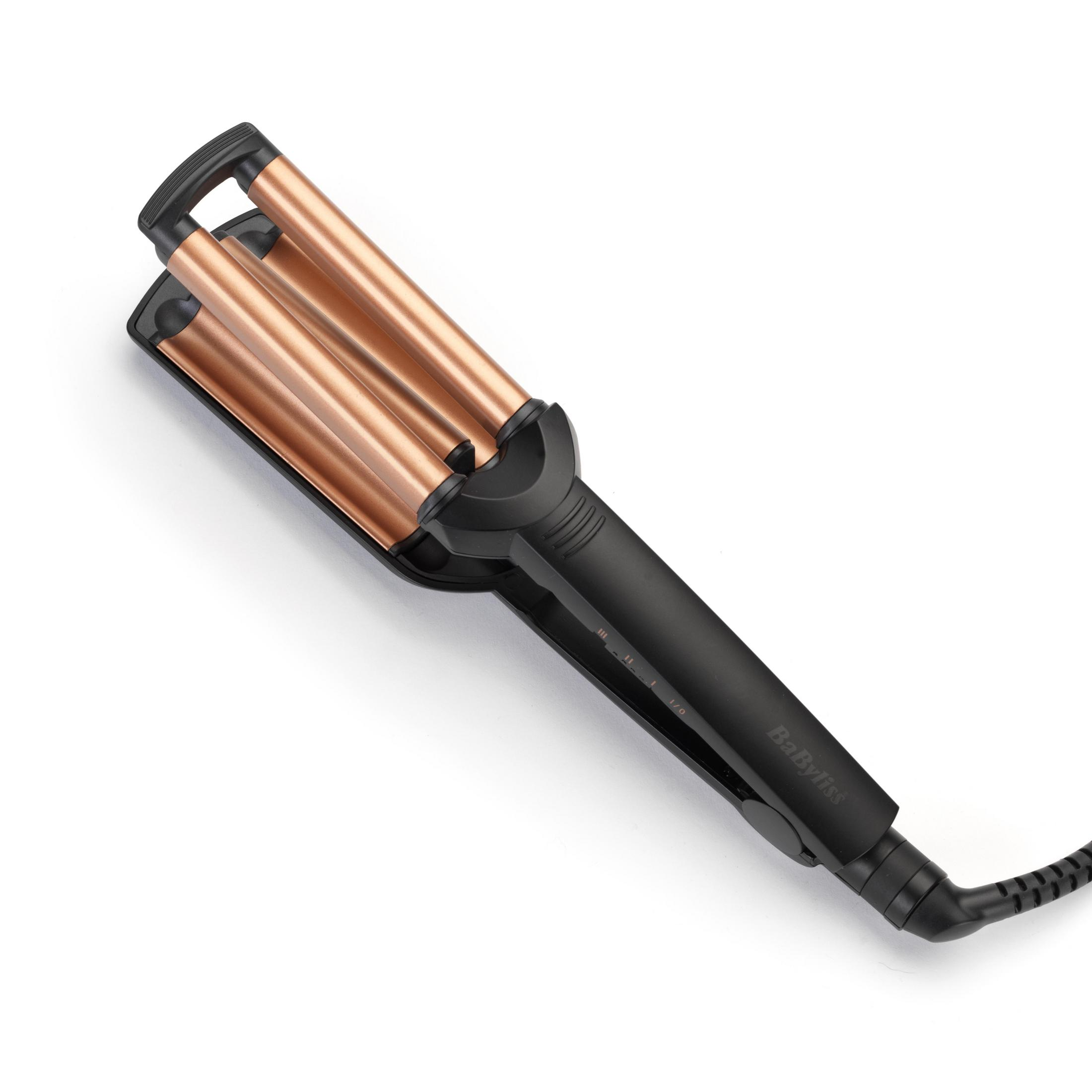 Schwarz-goldener Babyliss Haar-Waver. Weißer Hintergrund. Nahaufnahme, Schönheitsprodukt.
