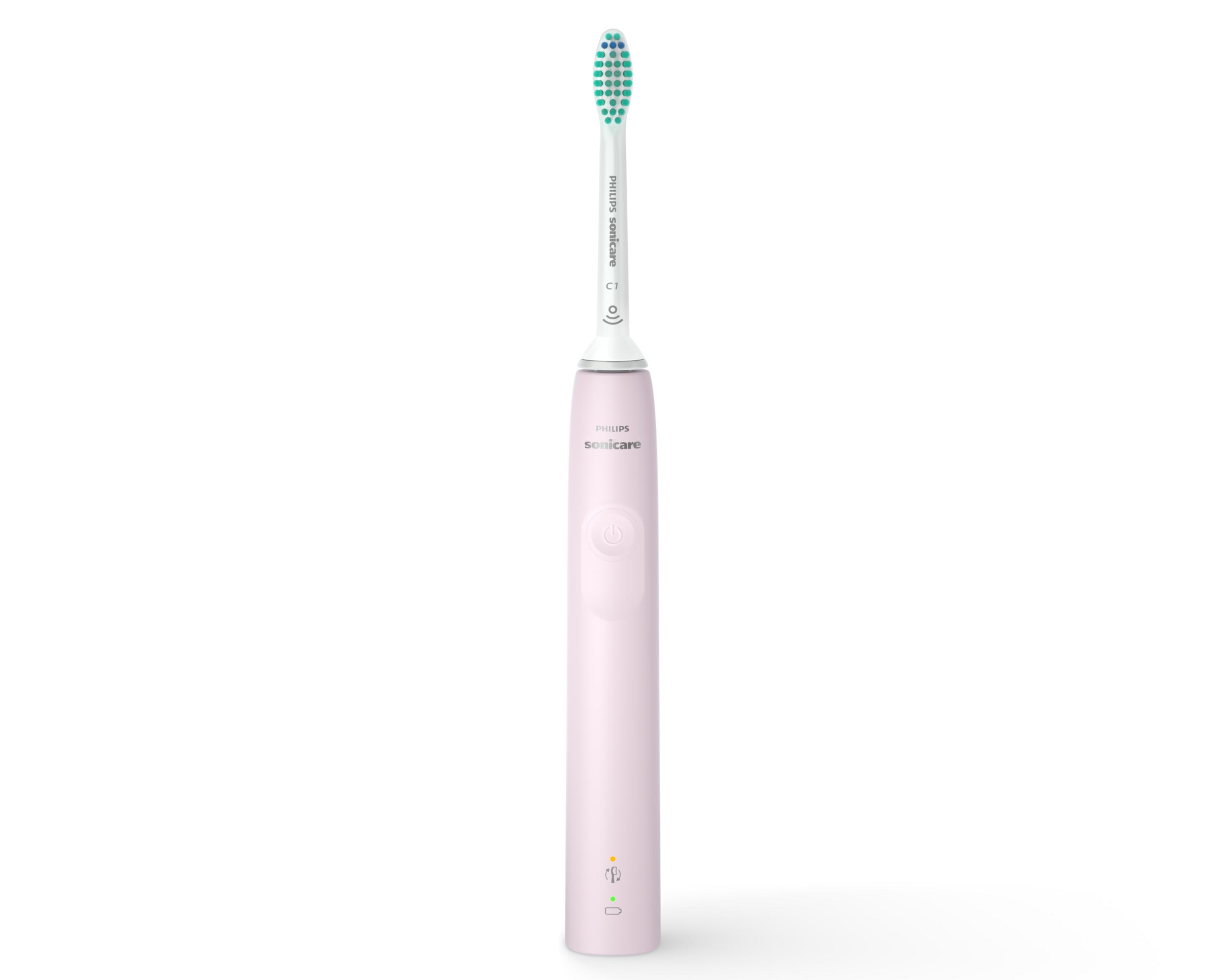 Różowa szczoteczka do zębów Philips Sonicare z zielonym włosiem na białym tle.
