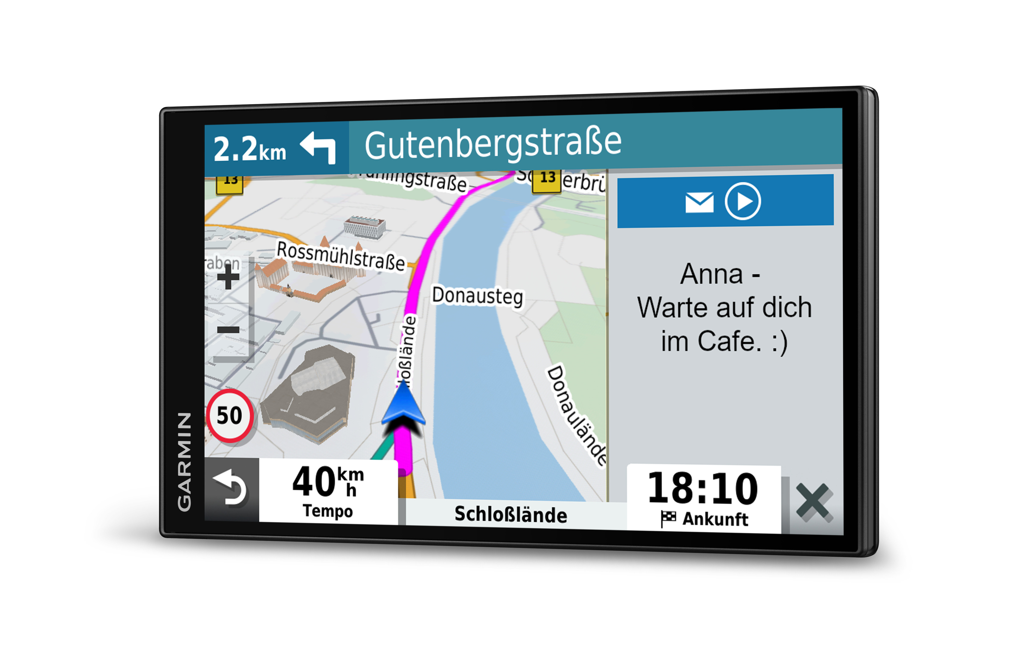 Ekran nawigacji samochodowej wyświetlający mapę i wiadomość. Trasa jest podświetlona na różowo.