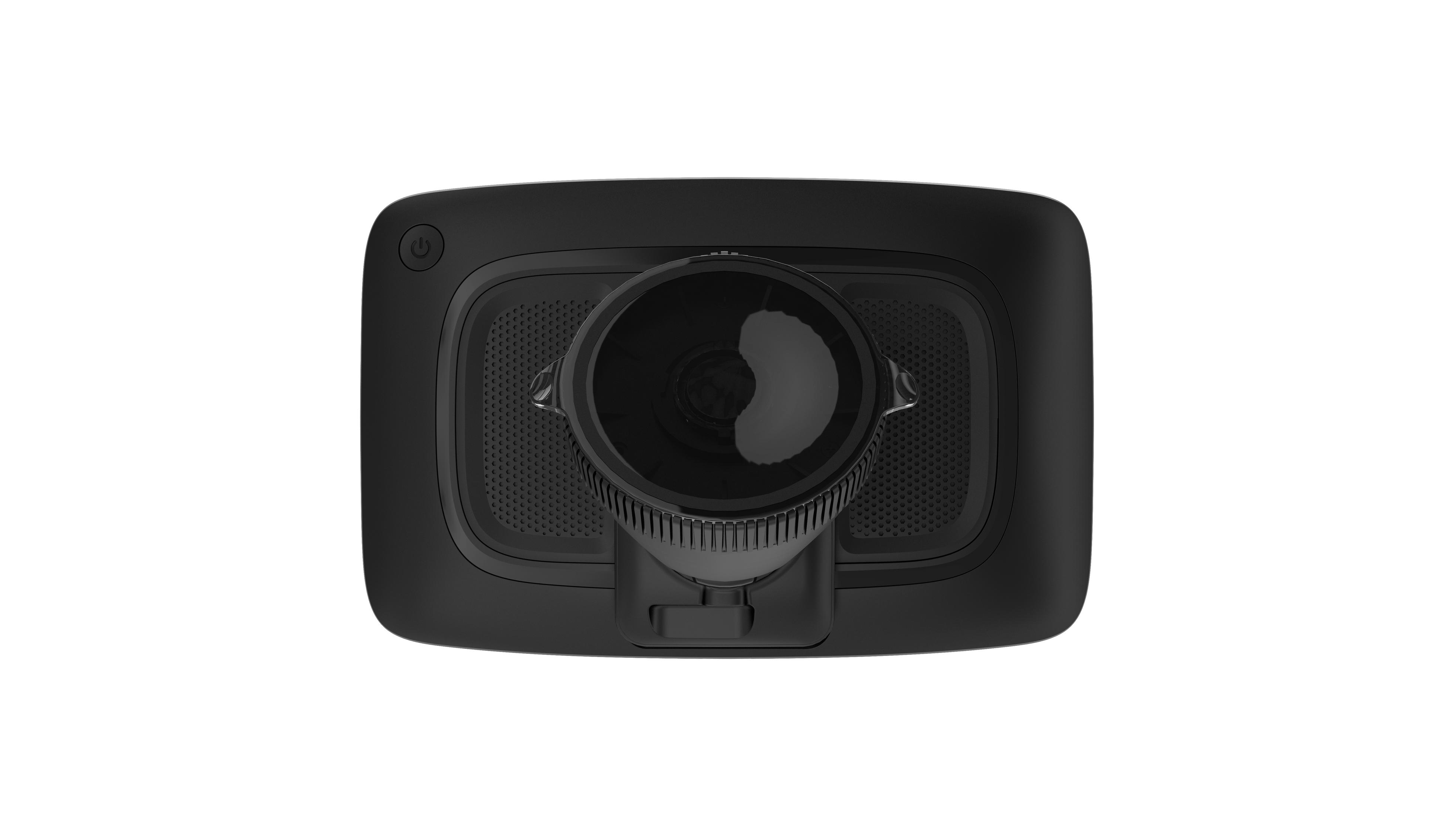 Een zwarte auto dashcam, van bovenaf gezien, met de lens en de aan/uit-knop.