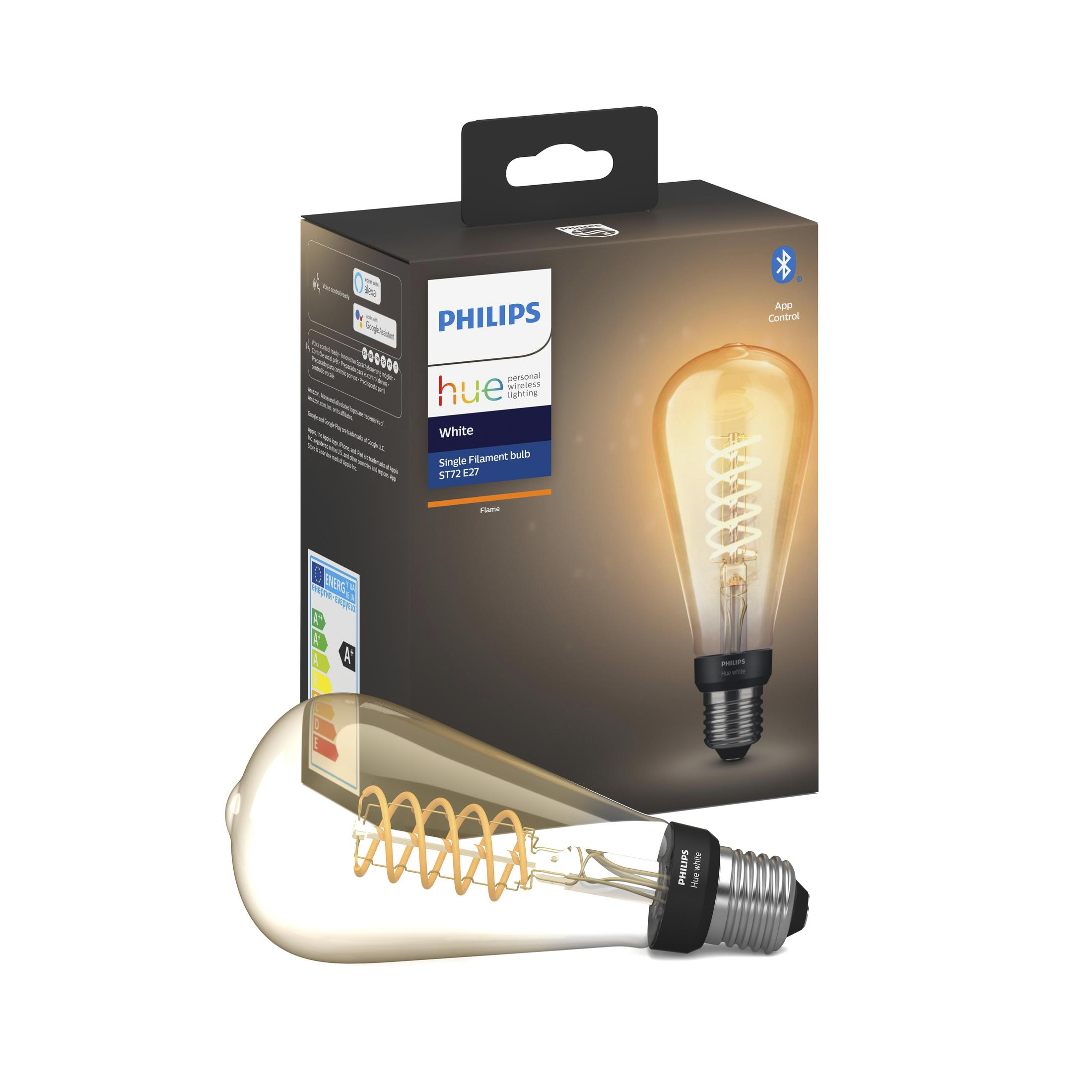 Żarówka smart Philips Hue i jej opakowanie na białym tle.