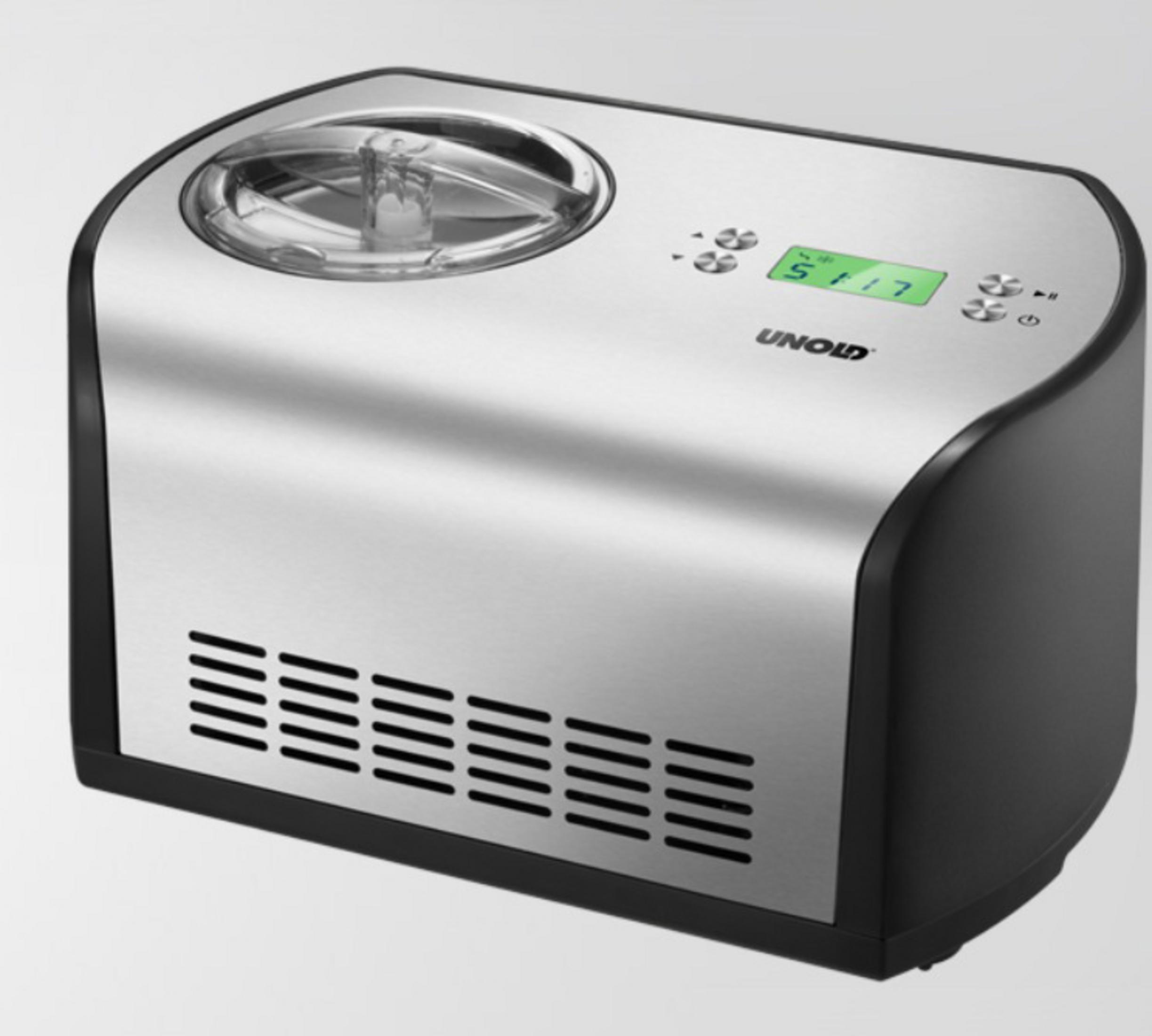 Máquina de helados plateada. Base negra, tapa transparente y pantalla digital, marca UNOLD.
