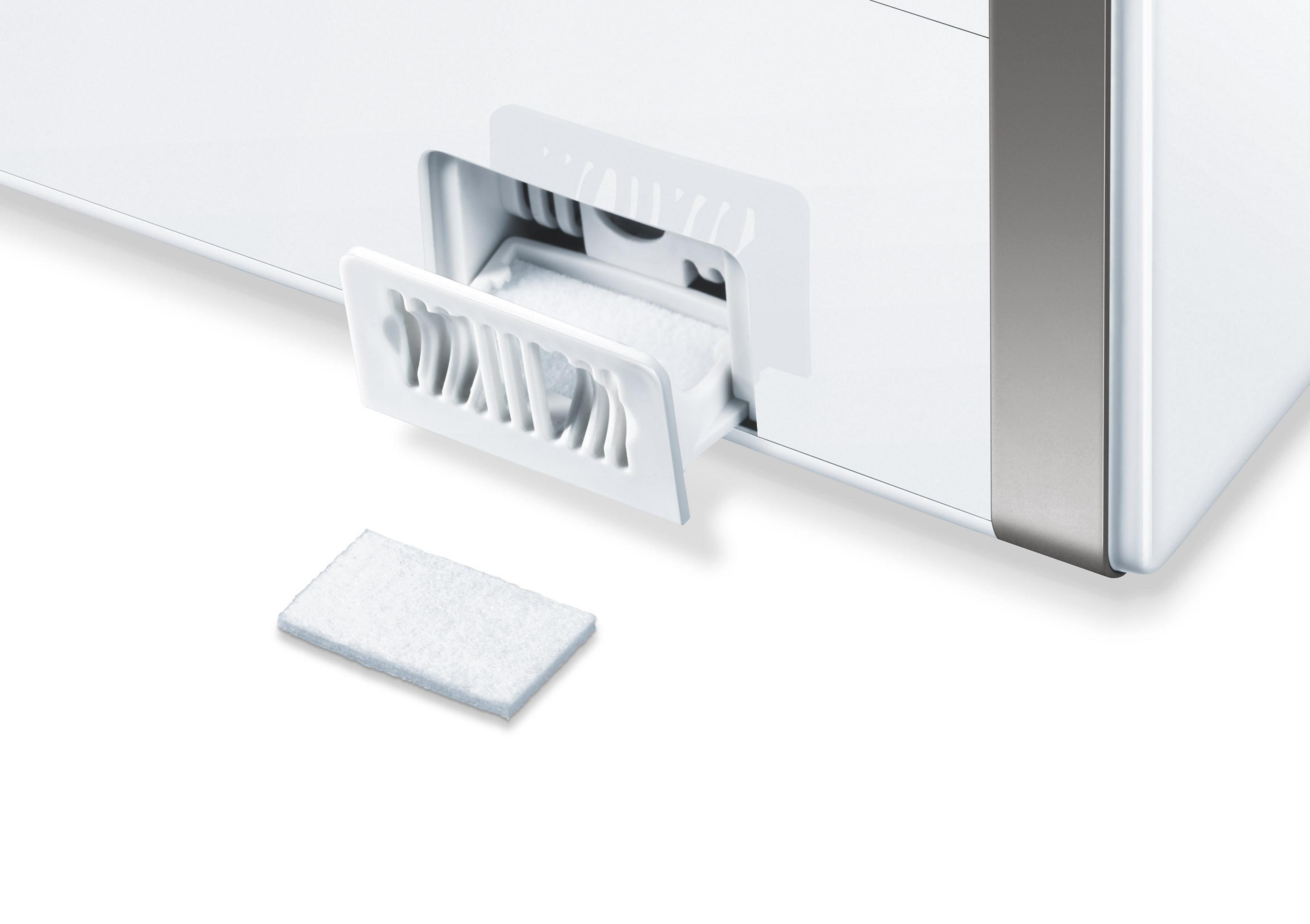 Dispositivo bianco con vano filtro aperto, che rivela un filtro e uno di ricambio staccato.