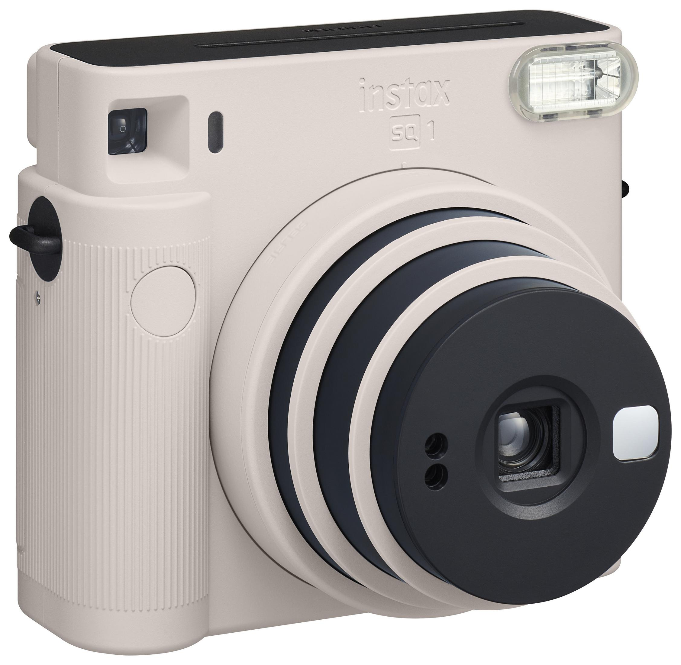 Cream colored Instax SQ1 instant camera with a black lens and flash.