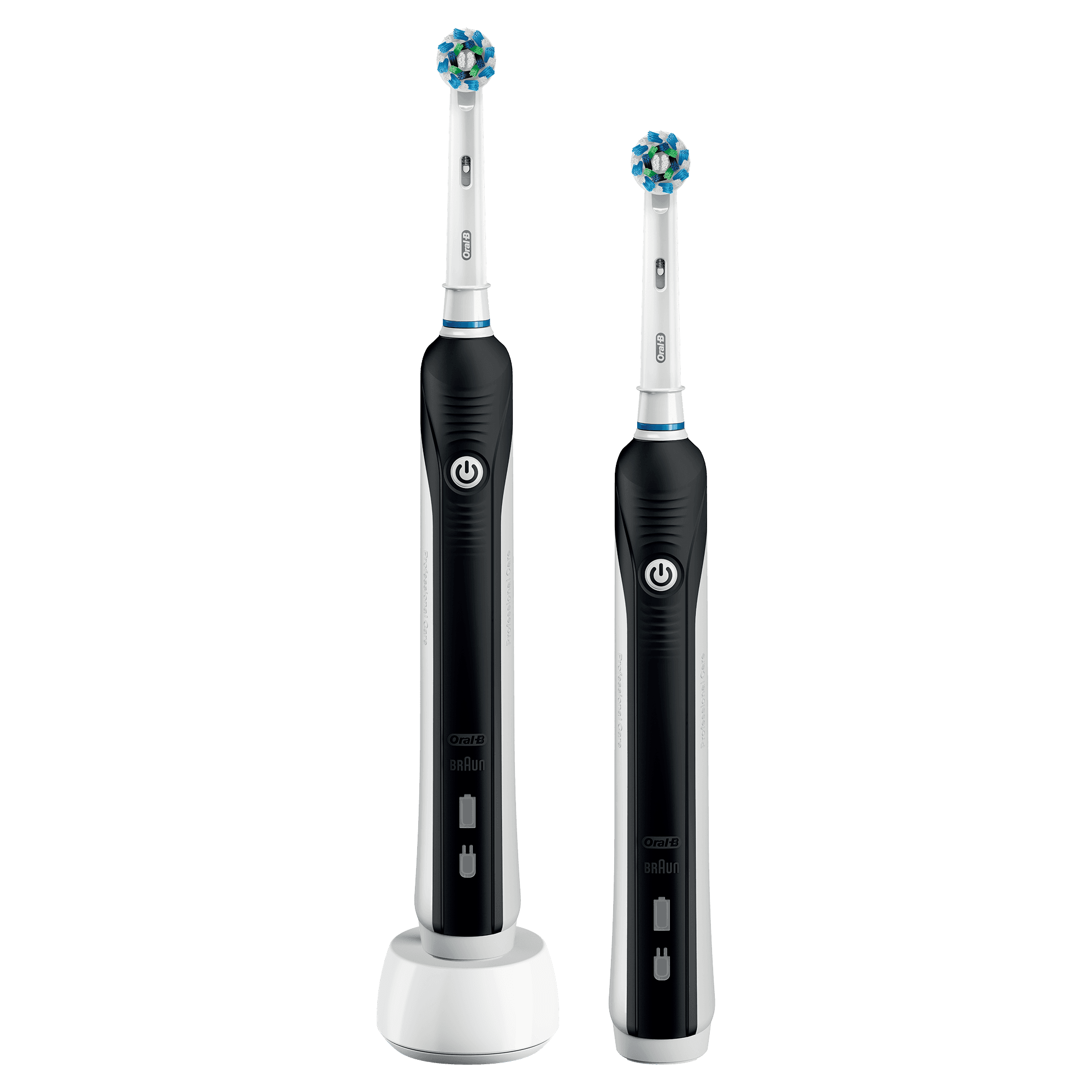 Dos cepillos de dientes eléctricos blancos y negros, uno en un cargador, aislados sobre fondo negro.